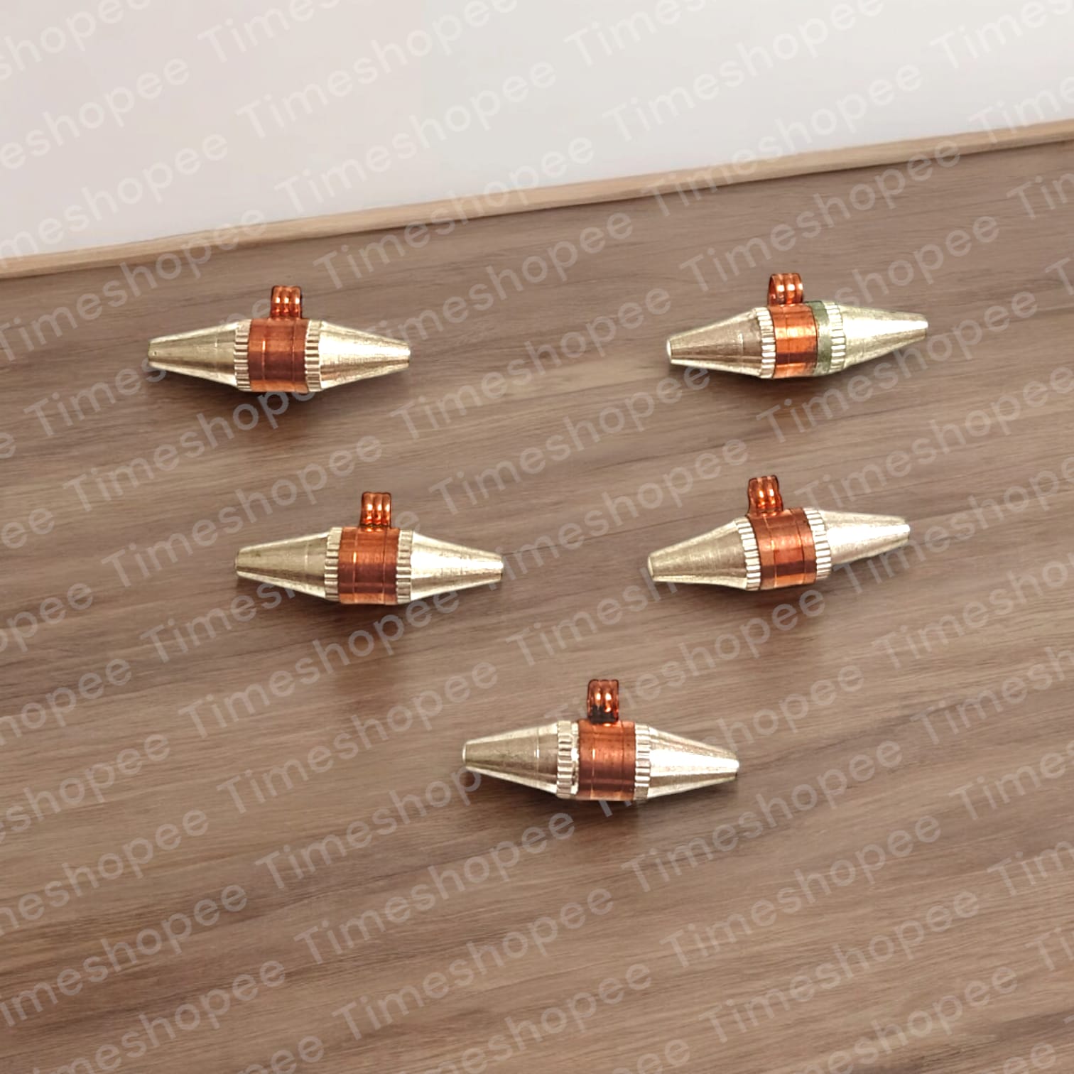 Set of five Triloh Taweez amulets made from iron, copper, and silver, with a Bhojpatra sheet, highlighting their multi-metal design and spiritual significance.