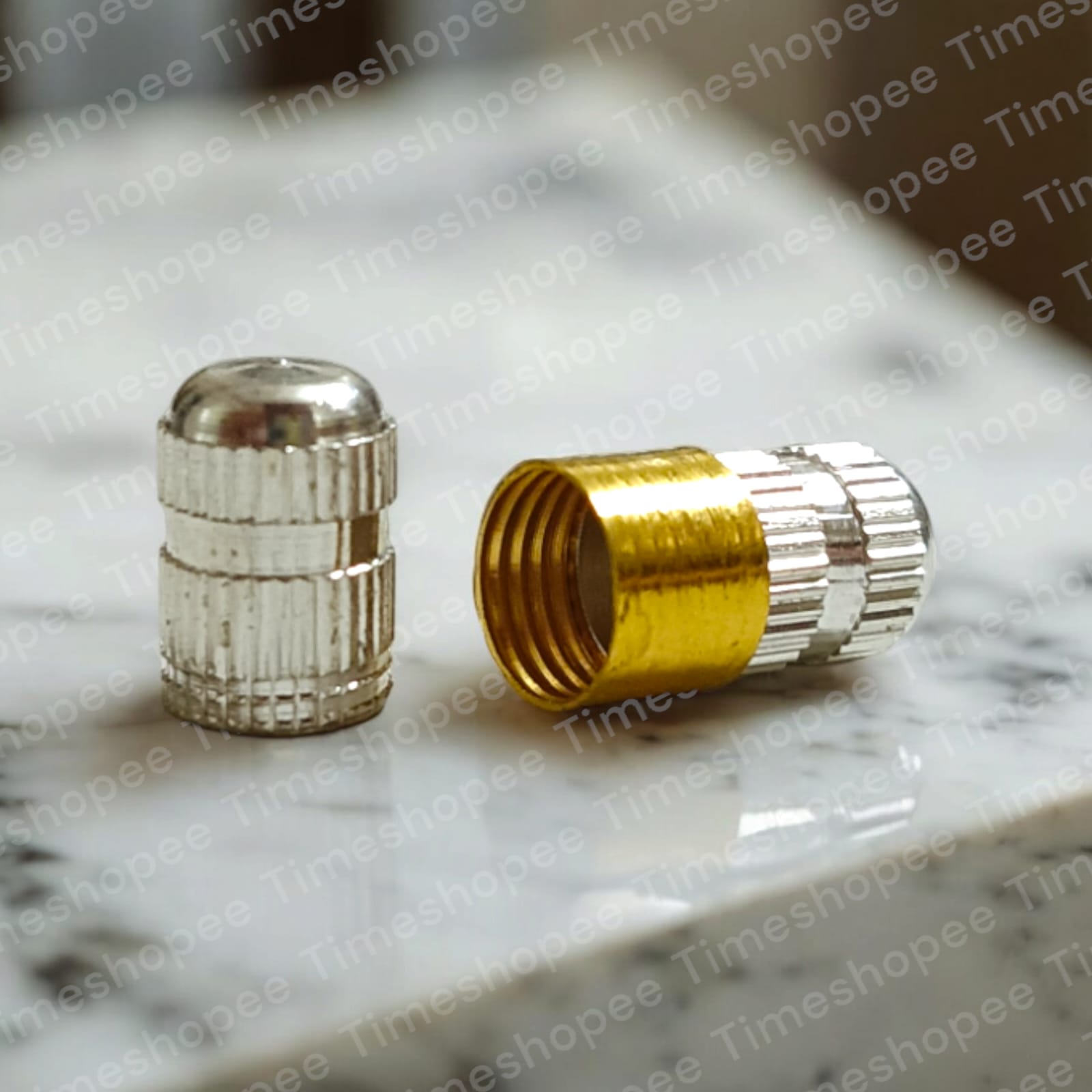 Set of five golden and silver taweez amulets with a Bhojpatra sheet, showcasing their elegant design and spiritual significance.