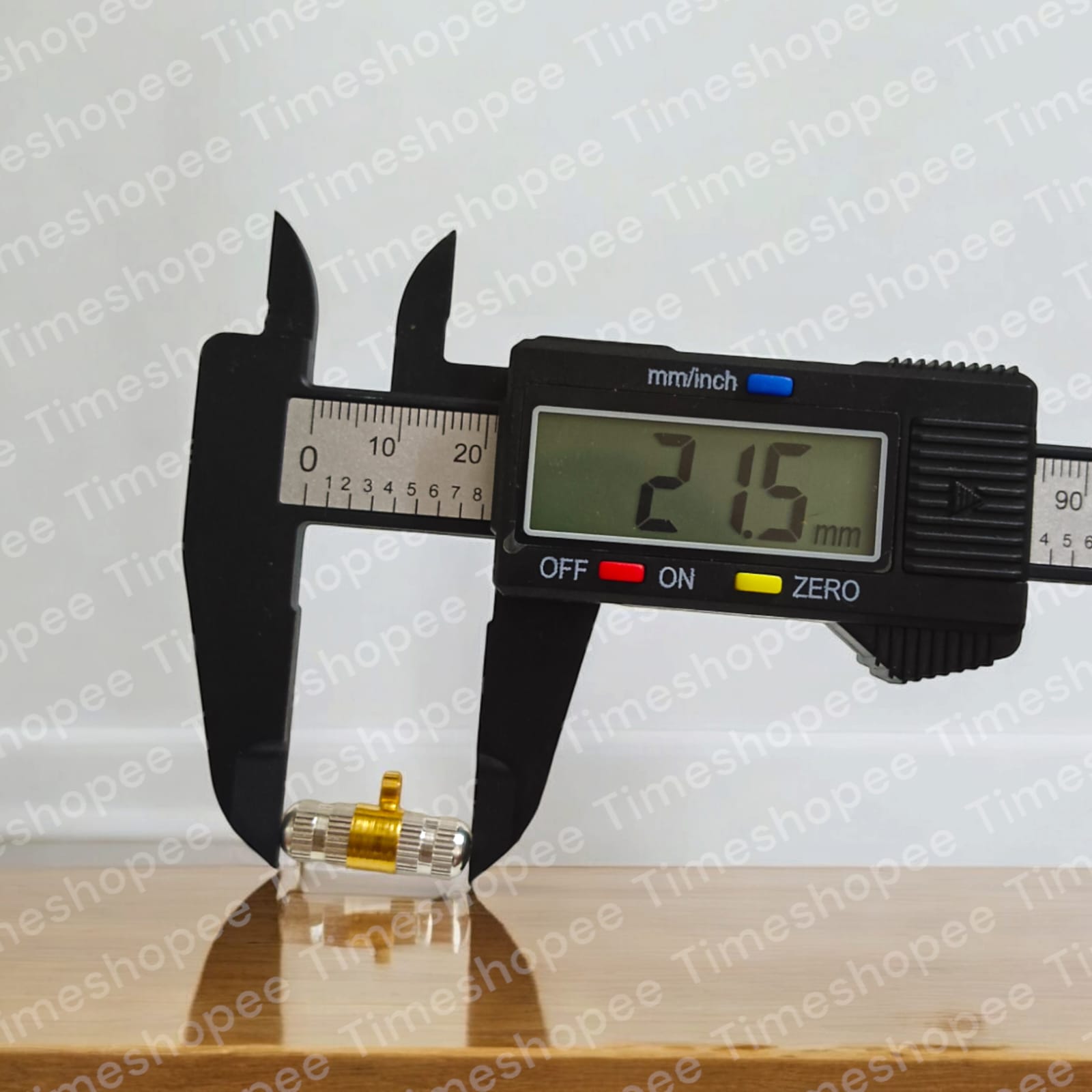 Set of five golden and silver taweez amulets with a Bhojpatra sheet, showcasing their elegant design and spiritual significance.