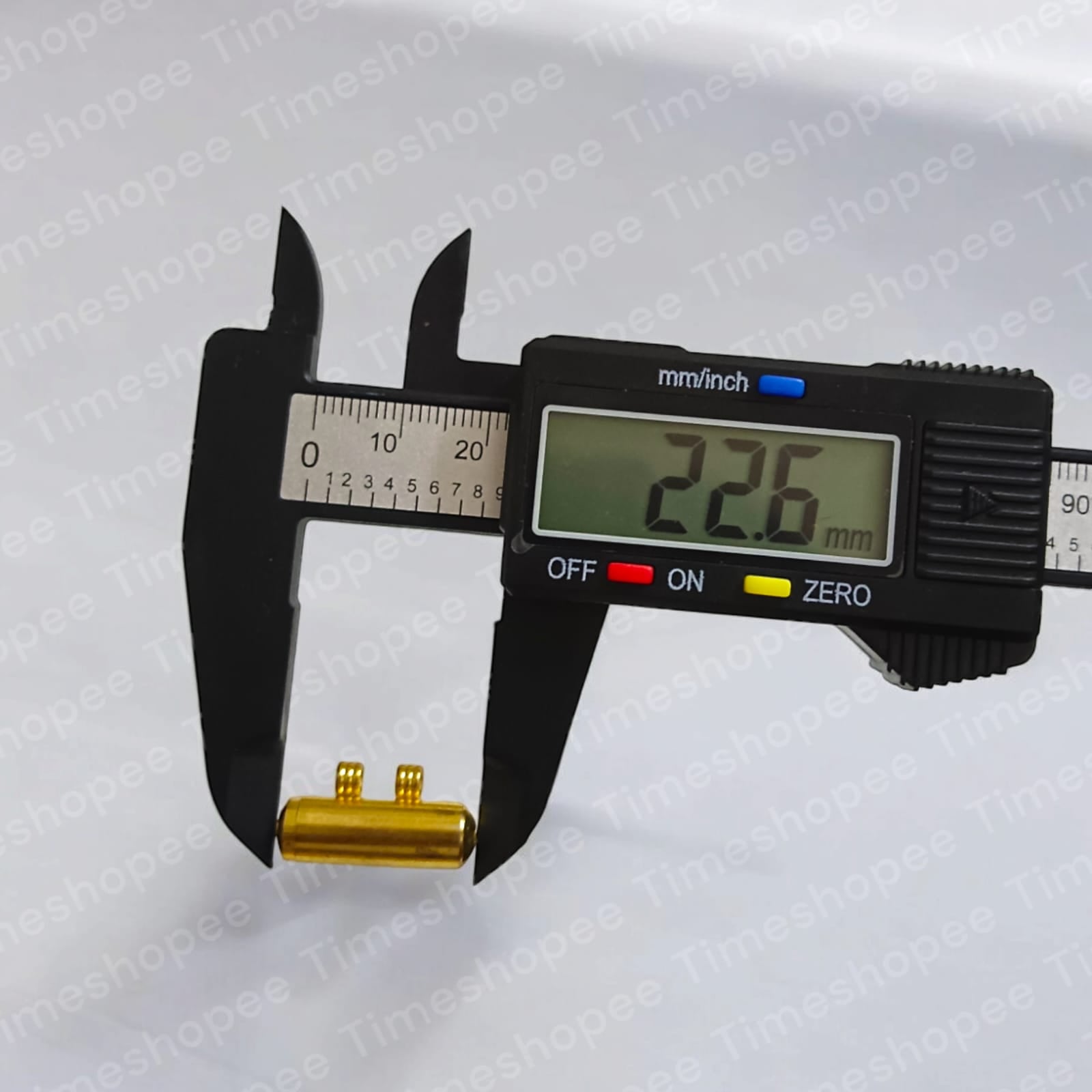 Set of five pure brass taweez amulets in golden color with a Bhojpatra sheet, highlighting their elegant design and spiritual purpose.