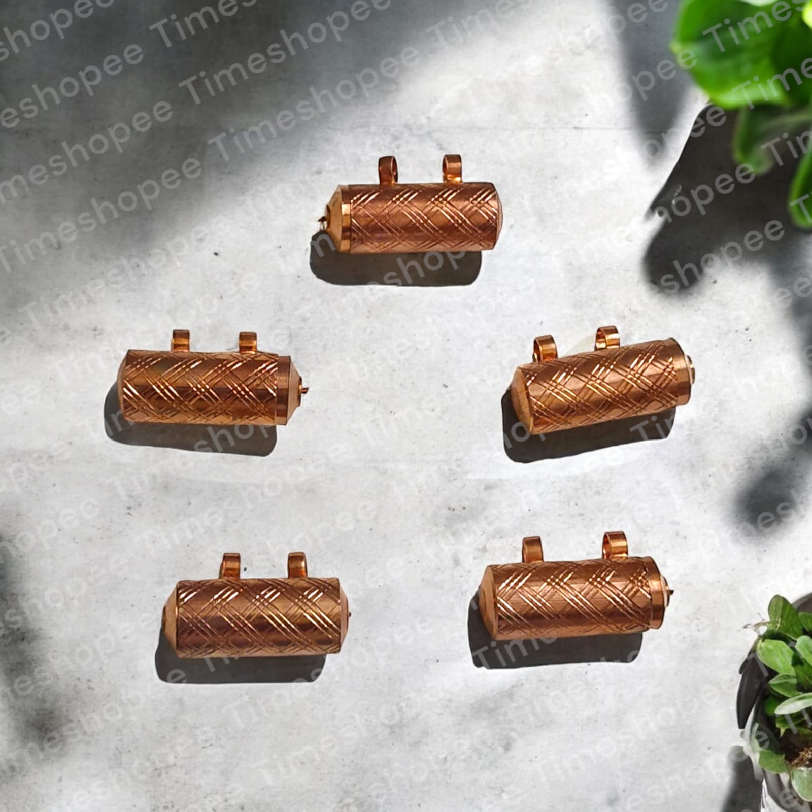 Set of five pure copper taweez amulets, available in small (22mm) and big (23mm) sizes, with a free Bhojpatra sheet, showcasing their elegant design and spiritual benefits.