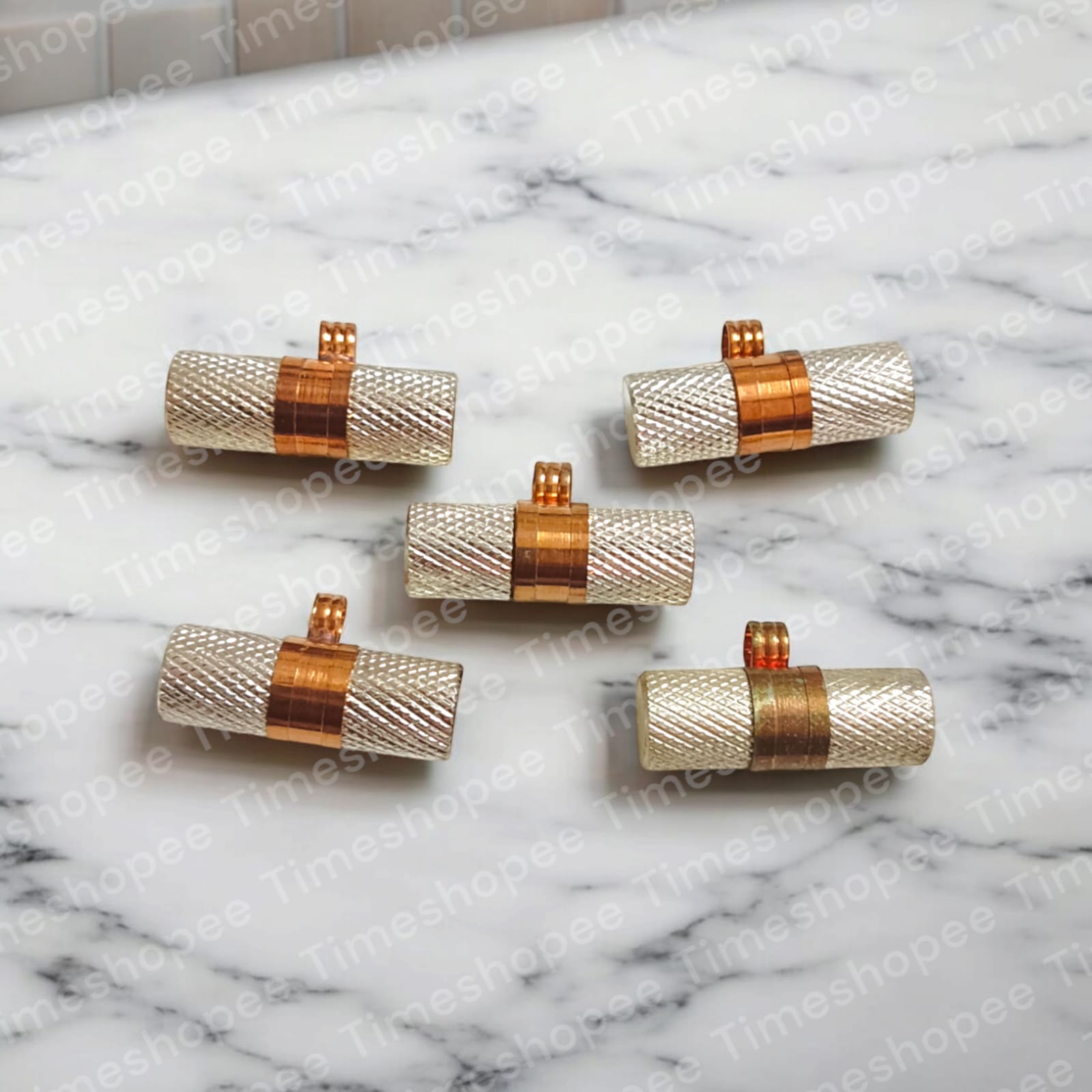 Set of five silver and copper taweez amulets in copper color, with a Bhojpatra sheet, showcasing their design and spiritual significance.