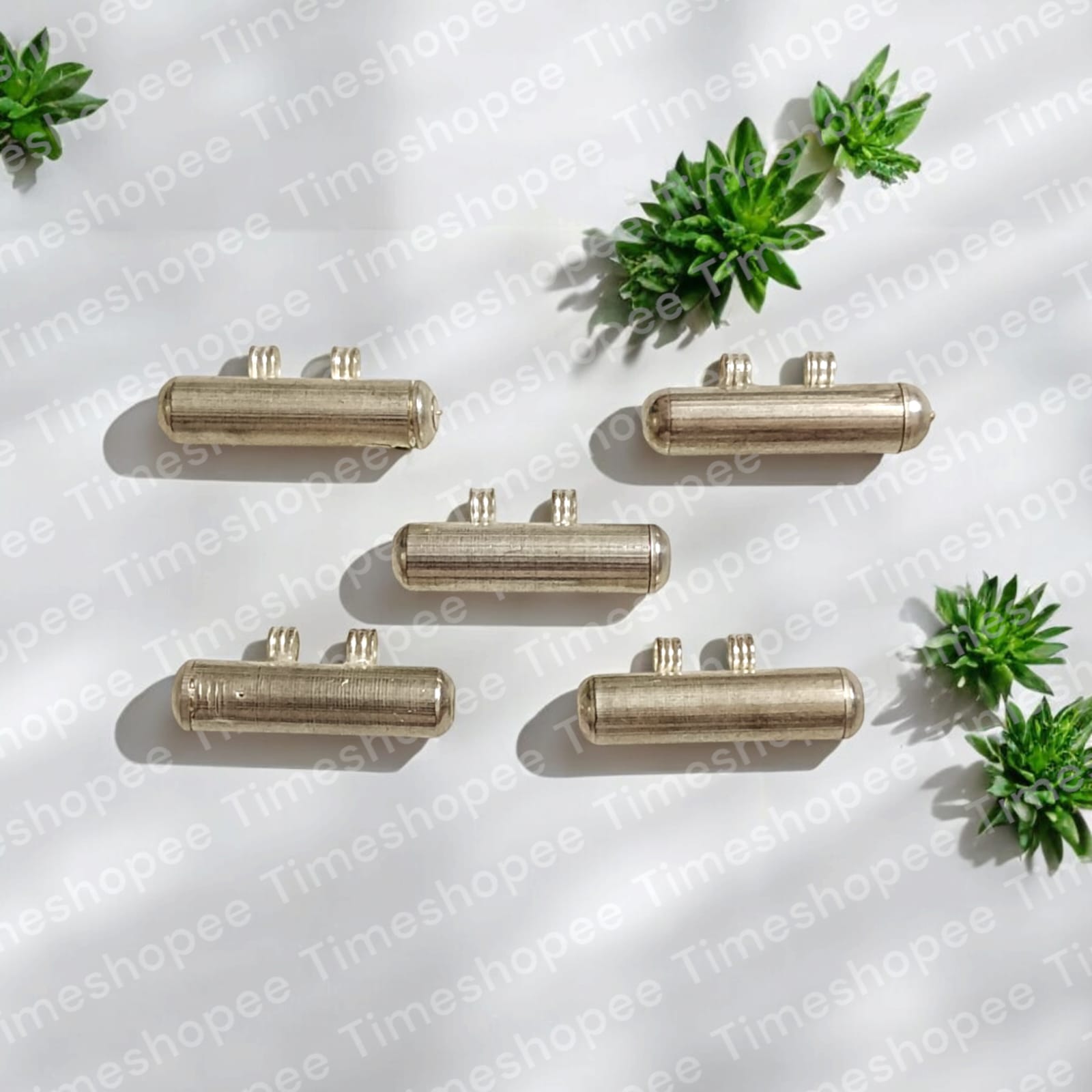 Set of five silver plated taweez amulets in silver color, available in big and small sizes, with a Bhojpatra sheet, showcasing their elegant design and spiritual significance.