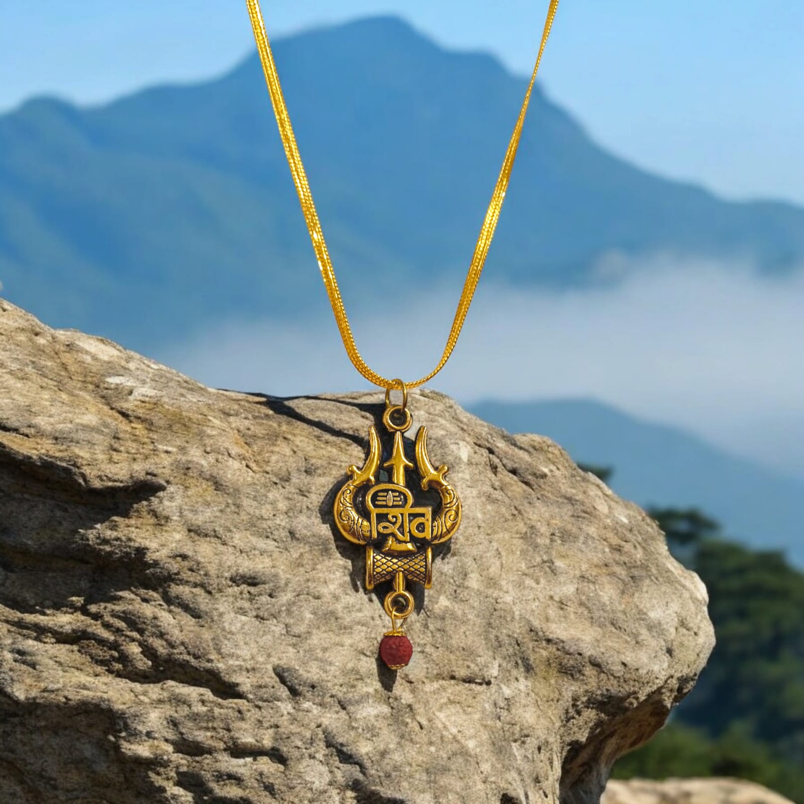 Shiv Locket with Rudraksha, featuring a Shiv Trishul and Damru pendant, gold-plated brass caps, and a free gold chain.