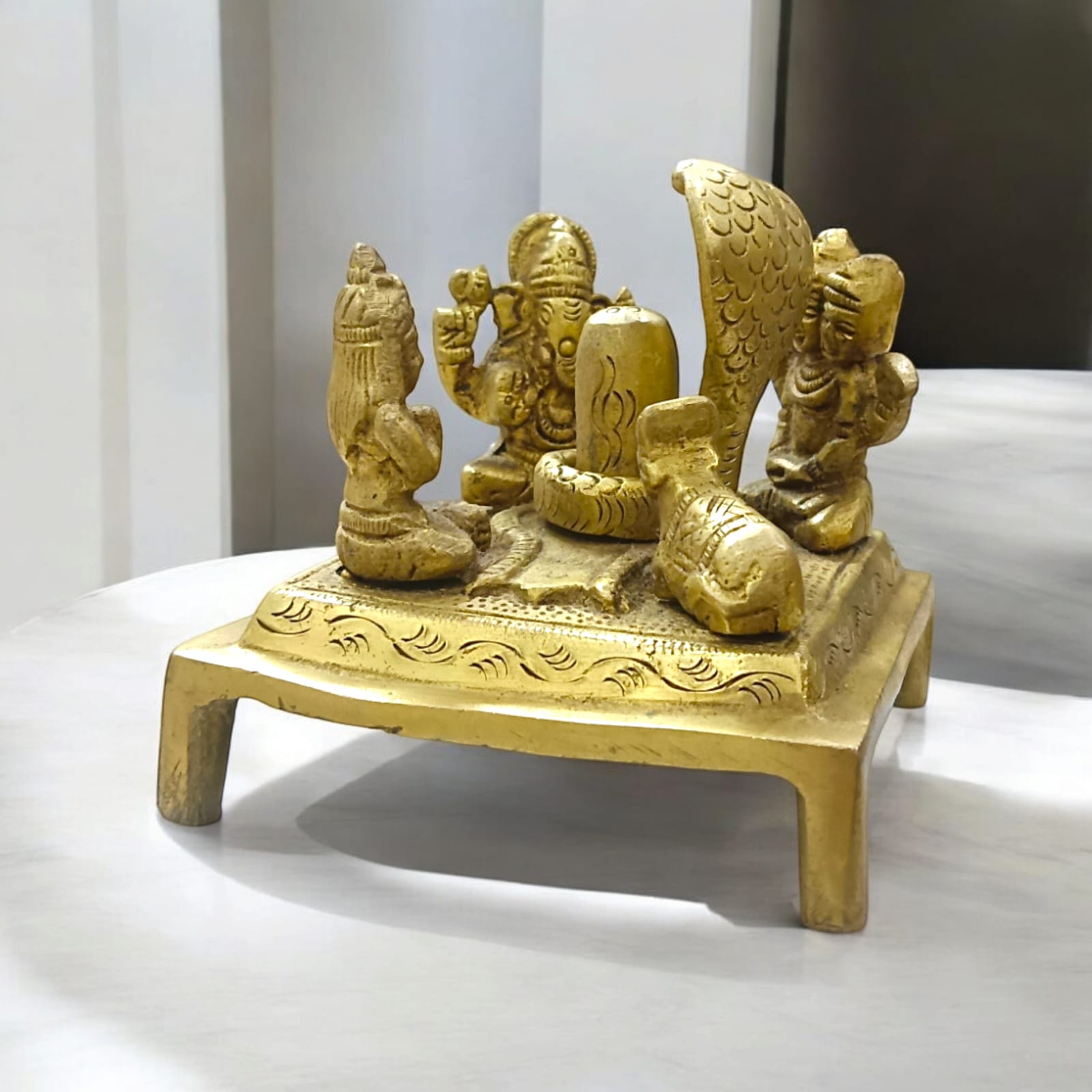 Shiv Pariwar with Shivling in brass, featuring Lord Shiva, Parvati, and their children, 8 cm x 9 cm, 714 gm.
