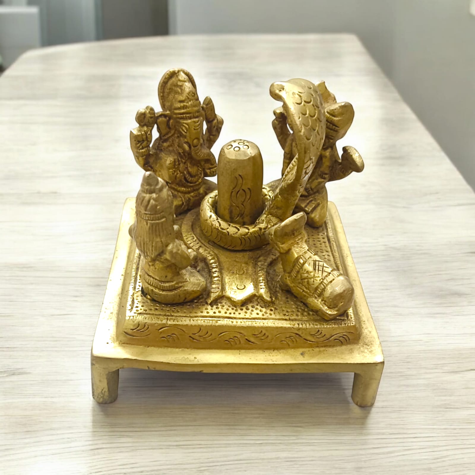 Shiv Pariwar with Shivling in brass, featuring Lord Shiva, Parvati, and their children, 8 cm x 9 cm, 714 gm.