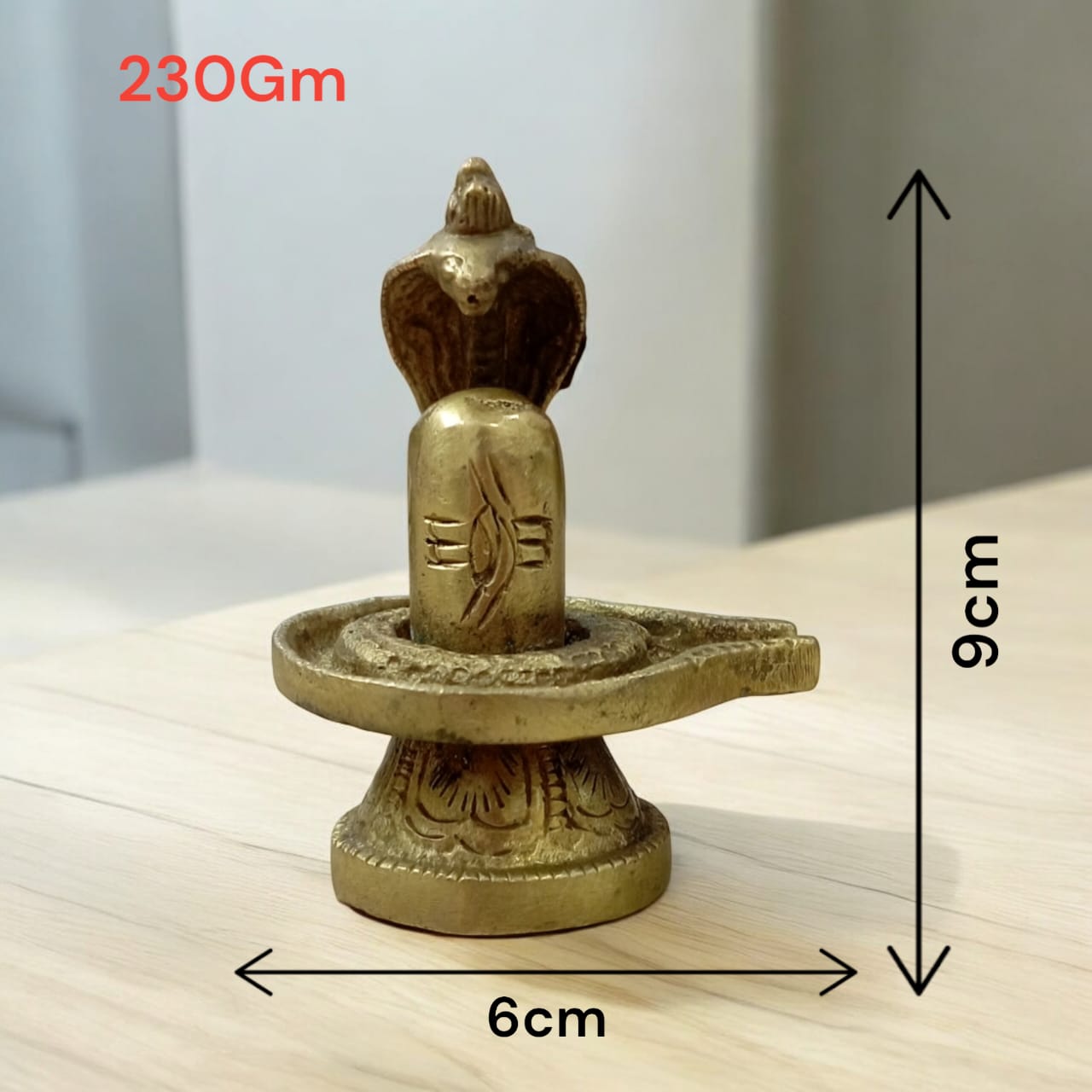 Shivling in Brass with Sheshnaag from Timeshopee, ideal for worship and spiritual decoration.