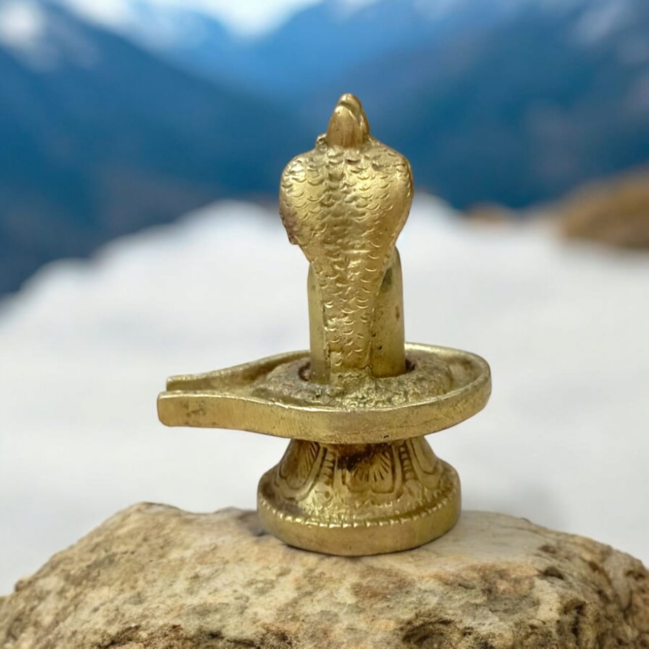 Shivling in Brass with Sheshnaag from Timeshopee, ideal for worship and spiritual decoration.