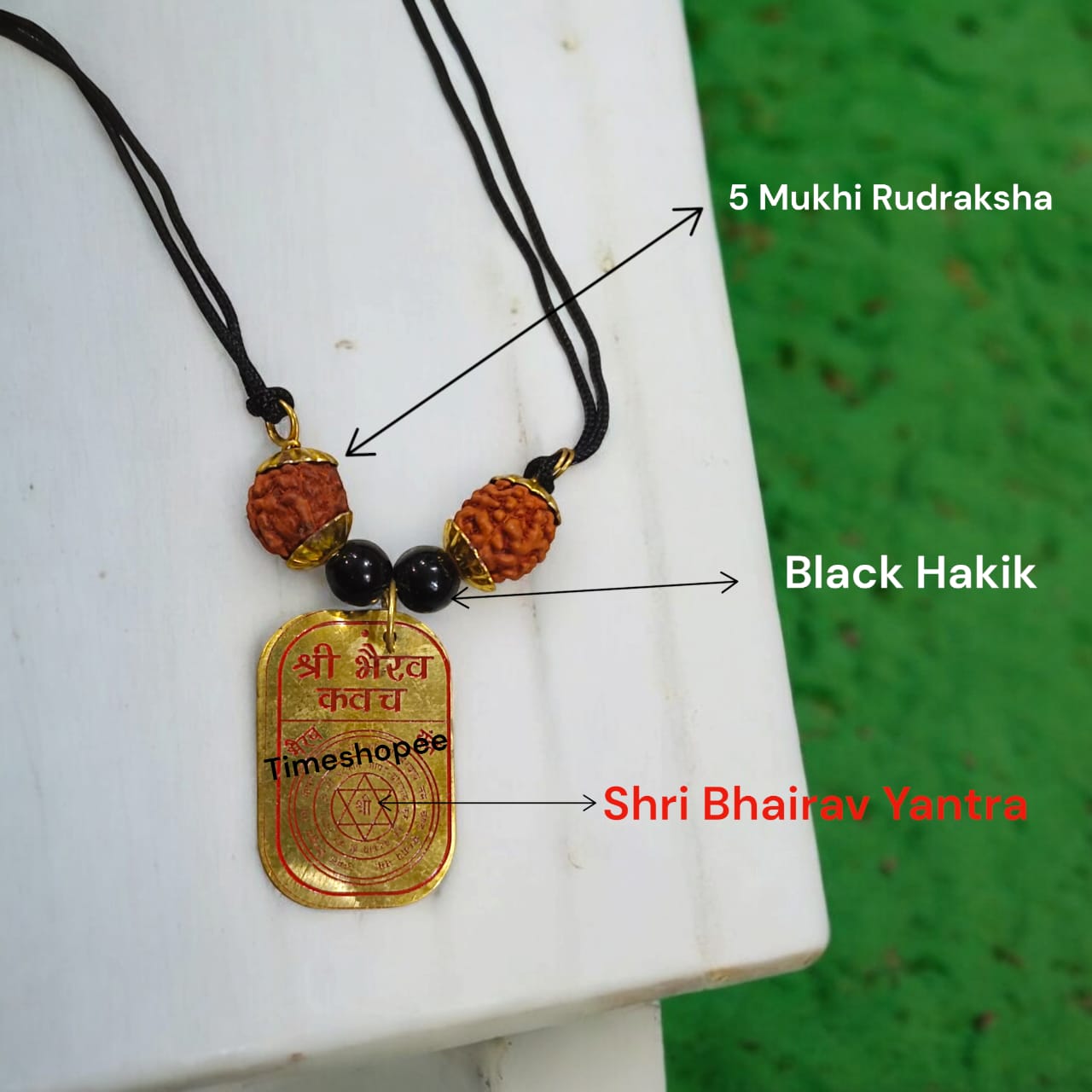 Sidh Bhairav Kavach featuring pure copper locket with 5 Mukhi Rudraksha and Black Agate beads on a black thread by Timeshopee