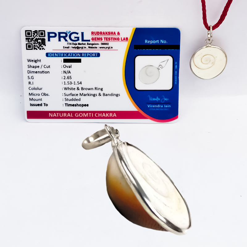 Silver Gomti Chakra locket with evil eye protection, lab certified, with thread from Timeshopee