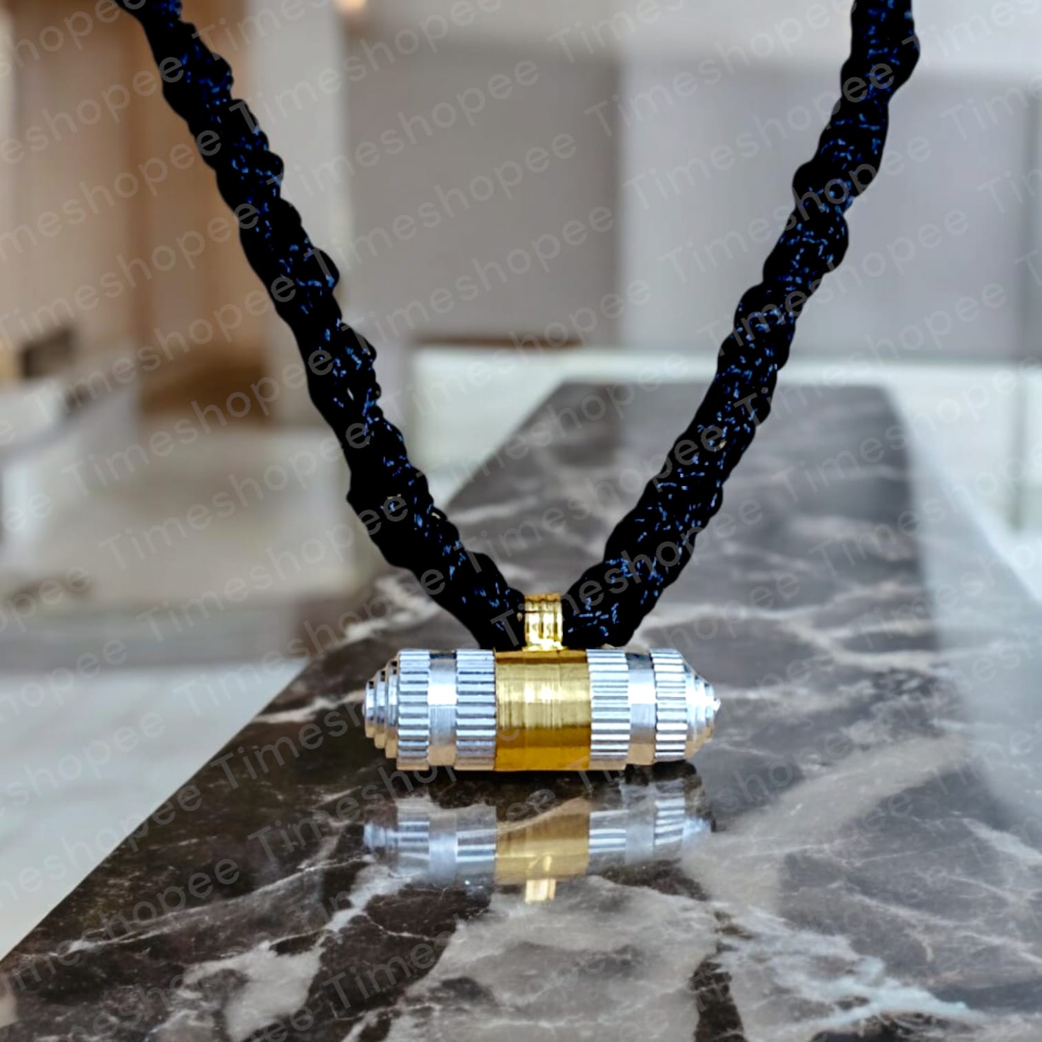 Silver and brass taweez amulets displayed with a Bhojpatra sheet, showcasing their elegant design and spiritual significance.