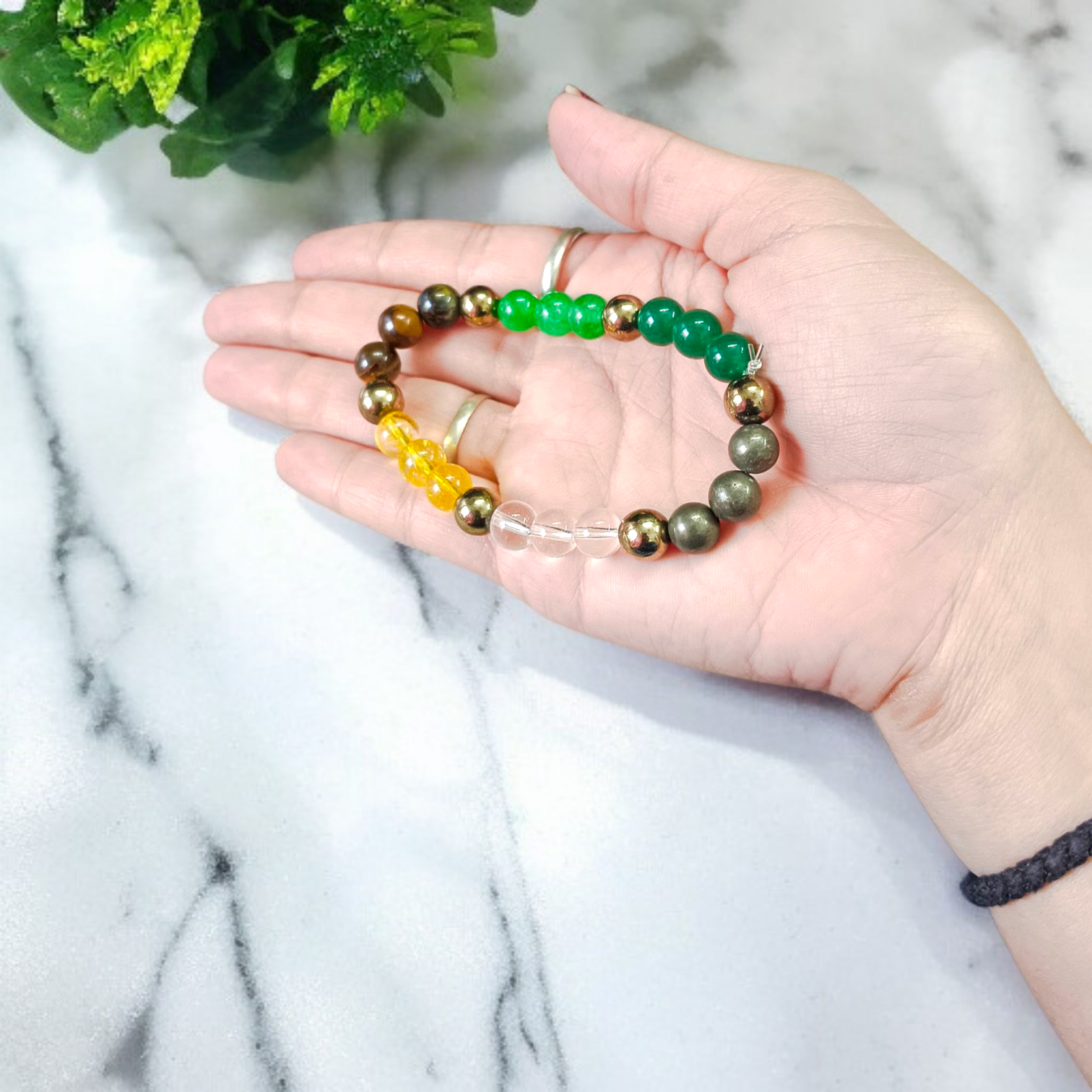 Spiritual Money Magnet Bracelet with 8mm Lab Certified Magnetic Beads on a stretchable band, ideal for meditation and daily wear