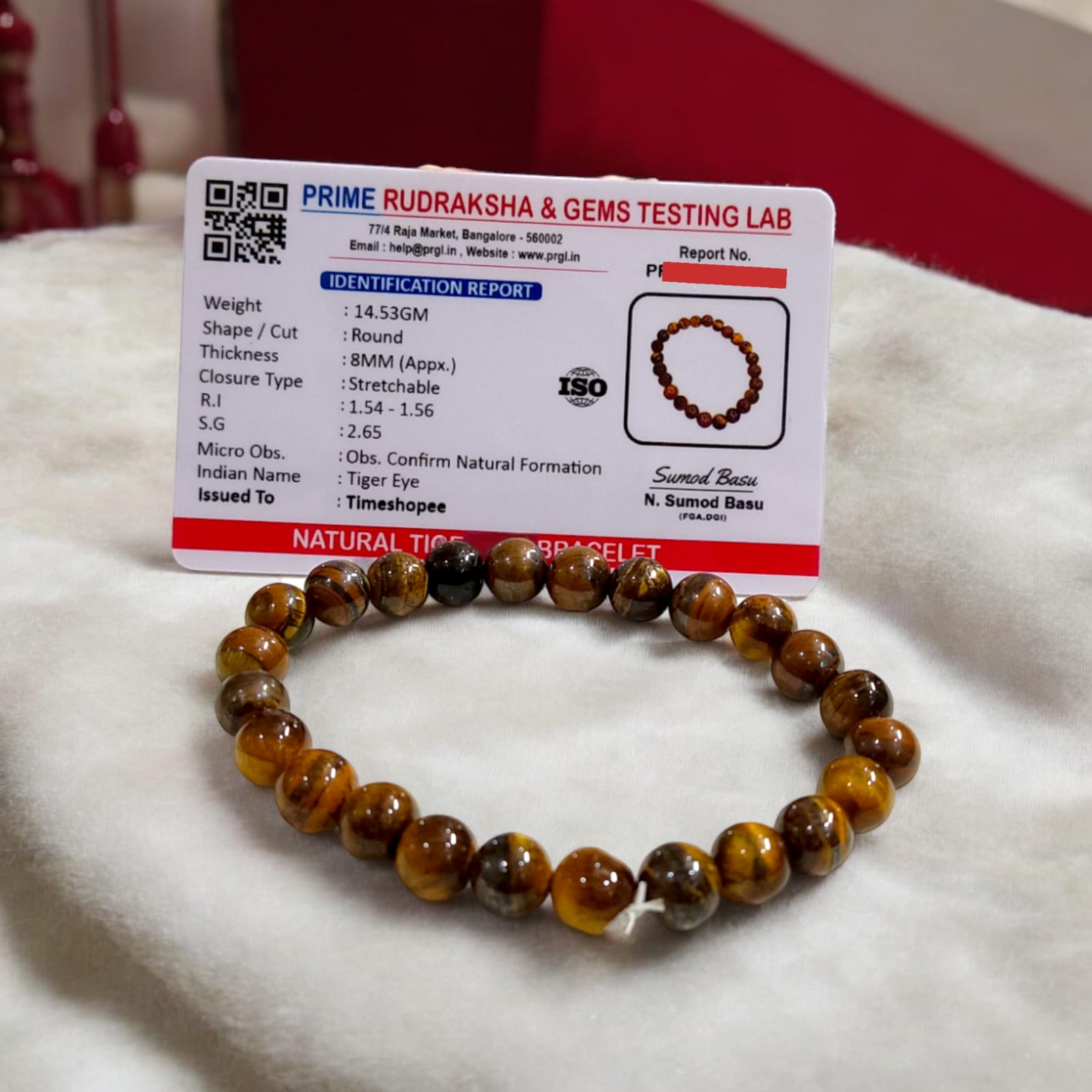 Tiger Eye bracelet, lab certified, available in two styles: stretchable and hook, showcased on a neutral background.