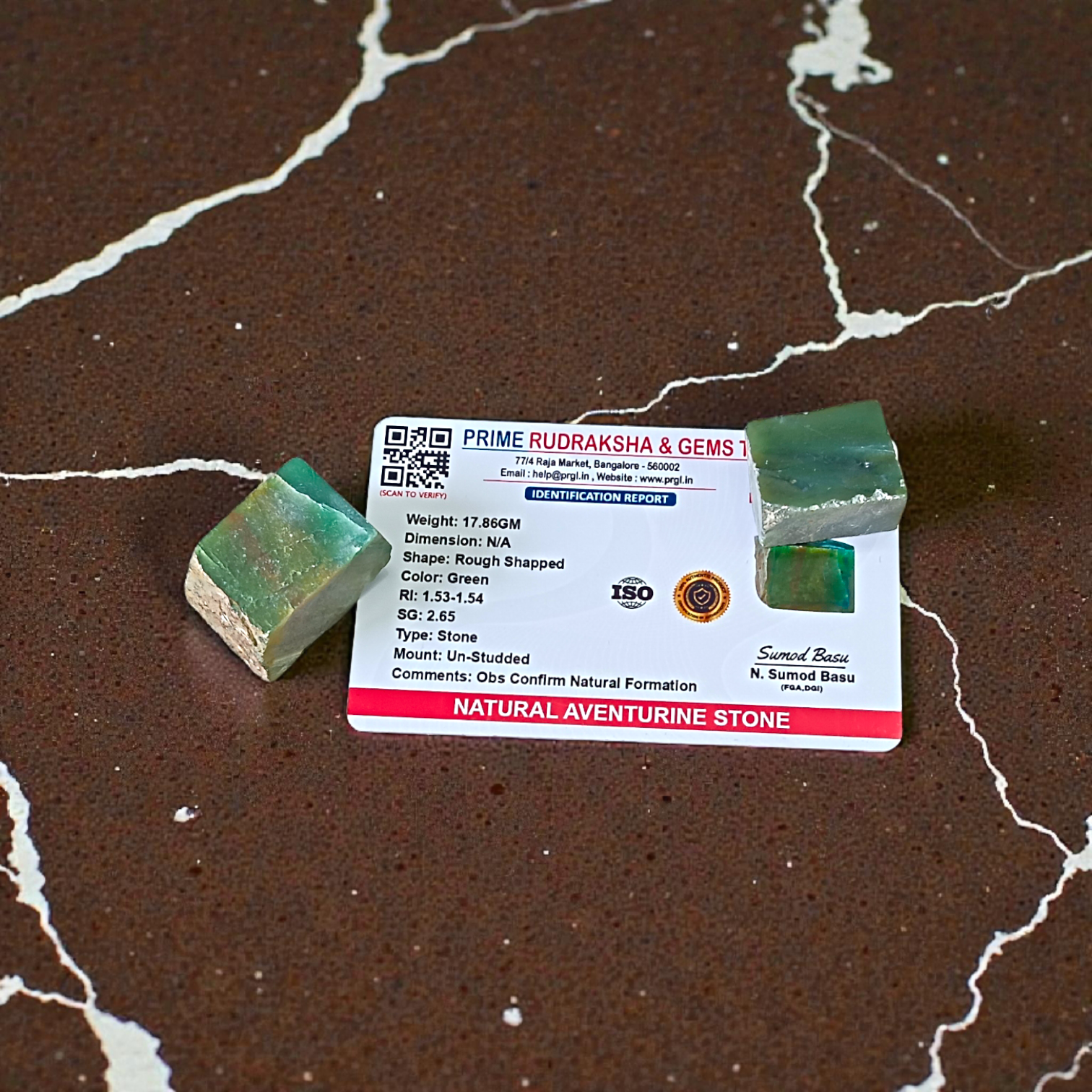 Two polished green Aventurine stones placed side by side, showcasing their smooth texture and natural crystal shine