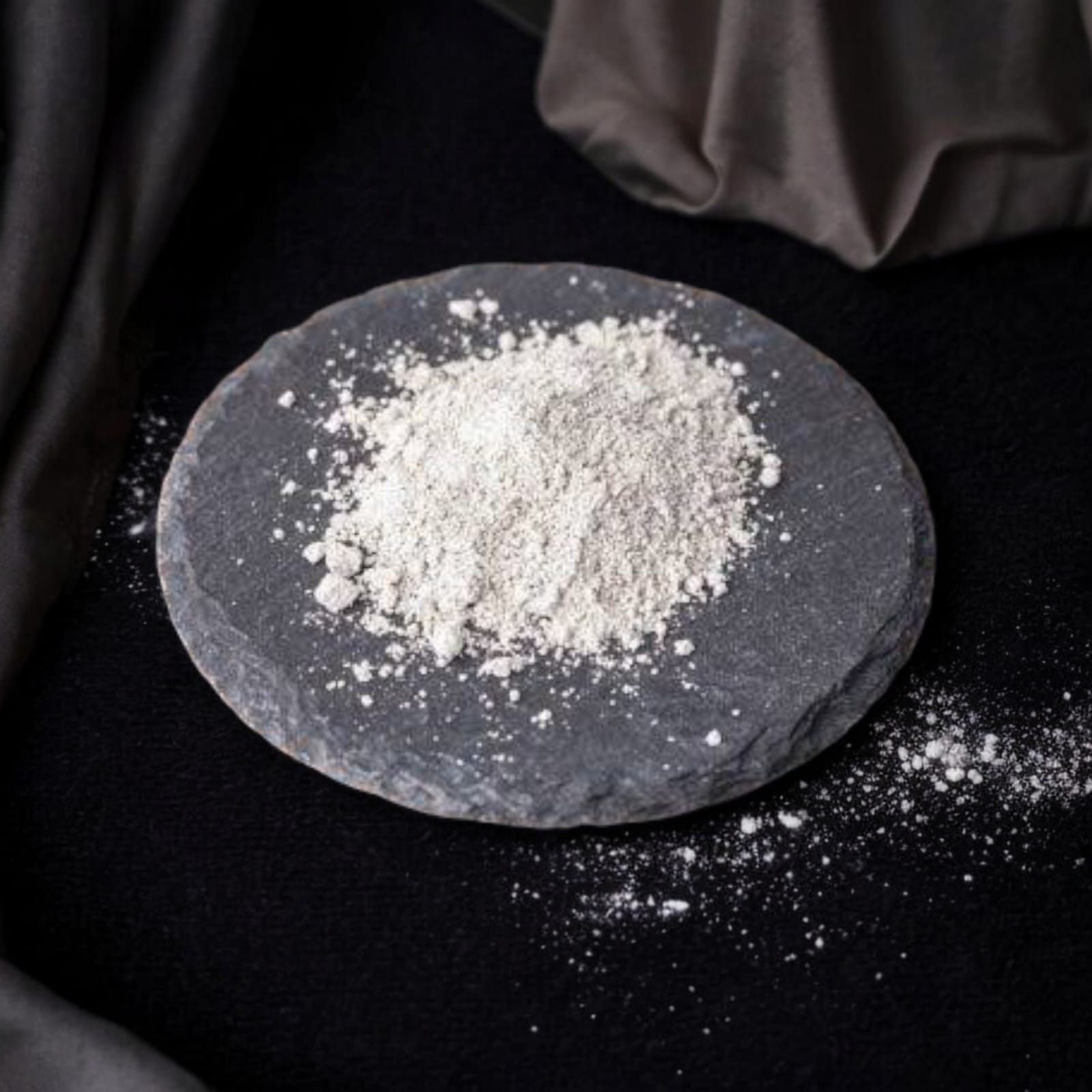 Vibhuti Bhasma holy ash in a 50-gram resealable zipper pouch, traditionally used for Hindu rituals and spiritual practices.