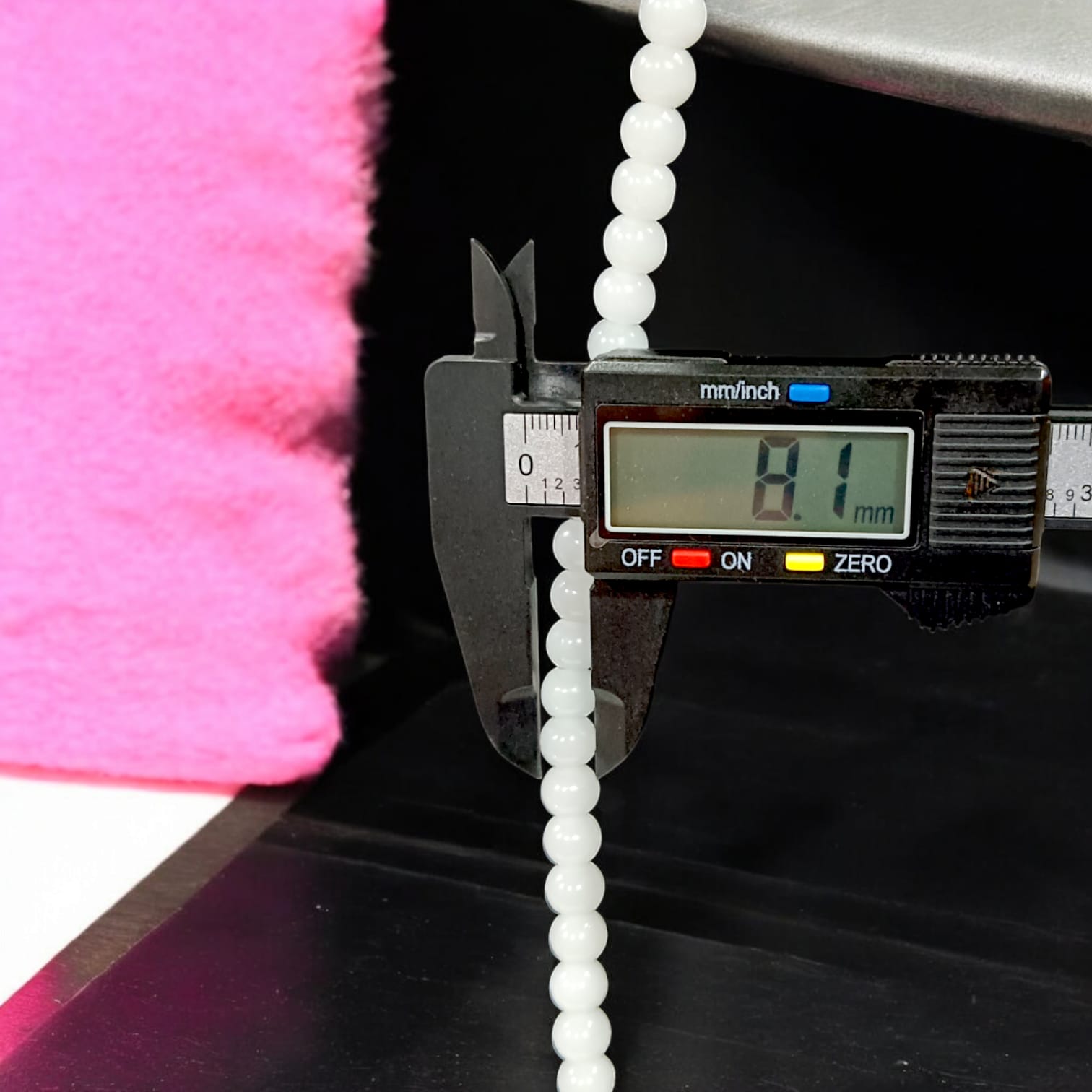 White Agate Mala with 8MM beads and 108+1 bead count, lab-certified for authenticity, displayed in a detailed close-up view.