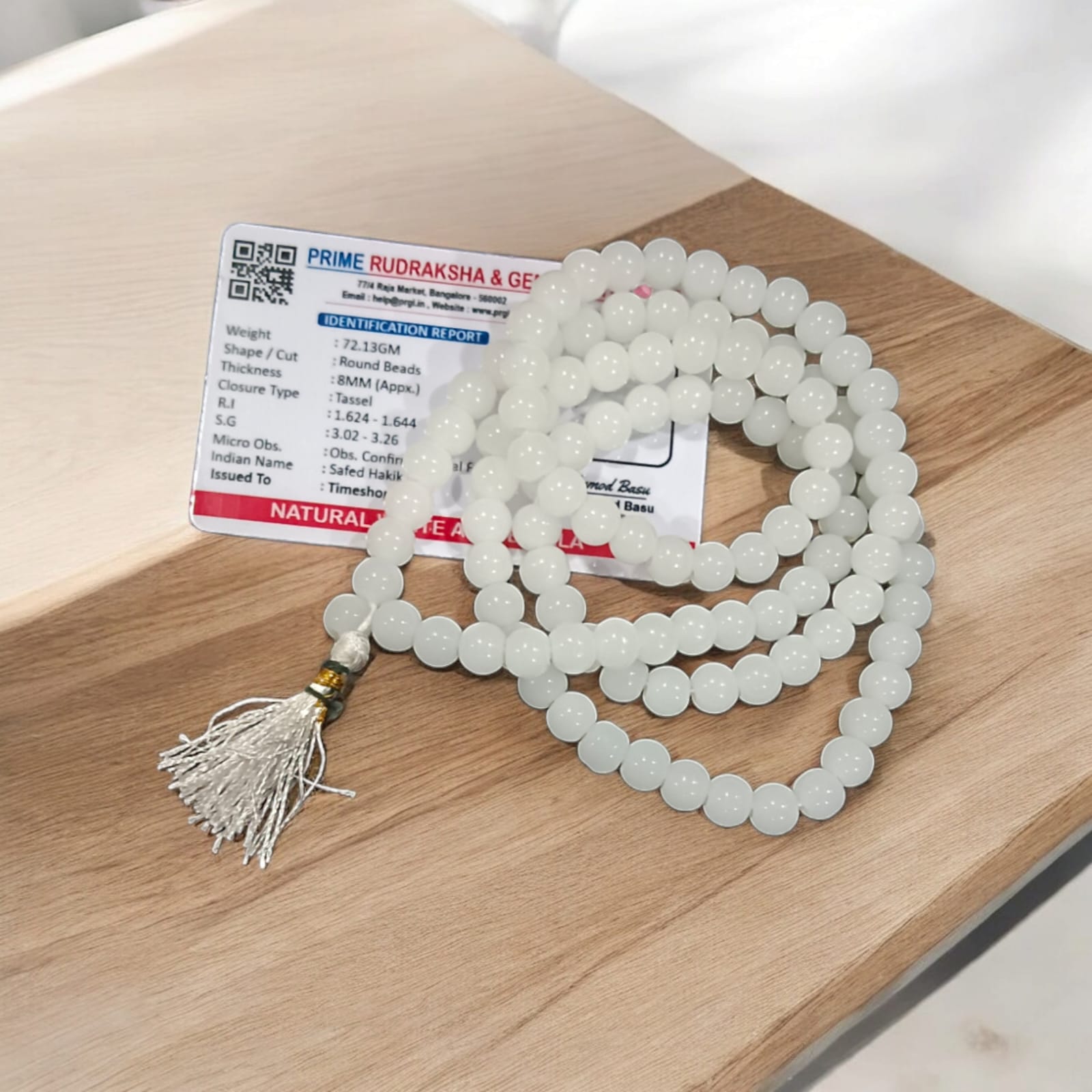 White Agate Mala with 8MM beads and 108+1 bead count, lab-certified for authenticity, displayed in a detailed close-up view.