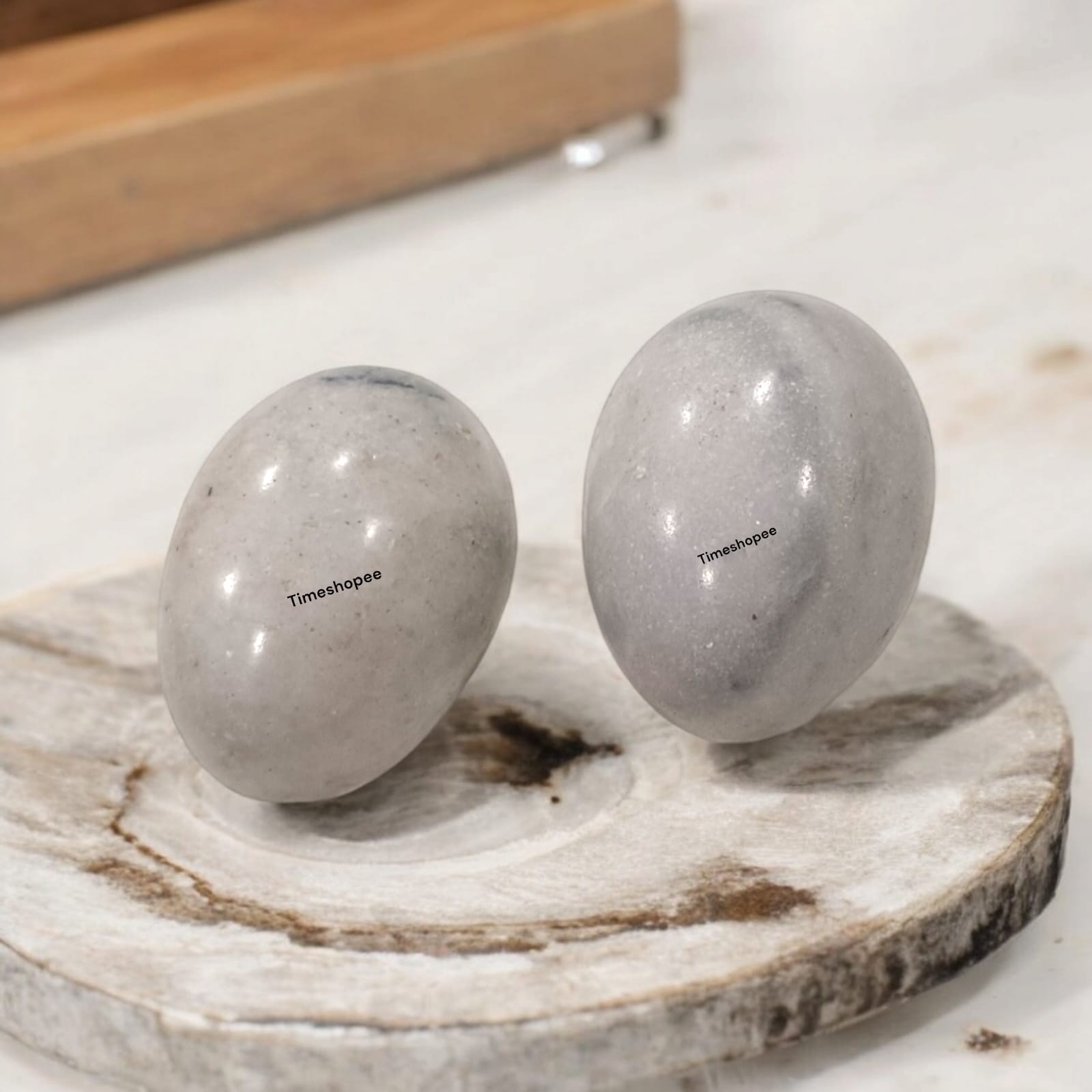 White and Black Shivling Stone for Tulsi and temple worship, representing Lord Shiva with an elegant dual-tone marble design.