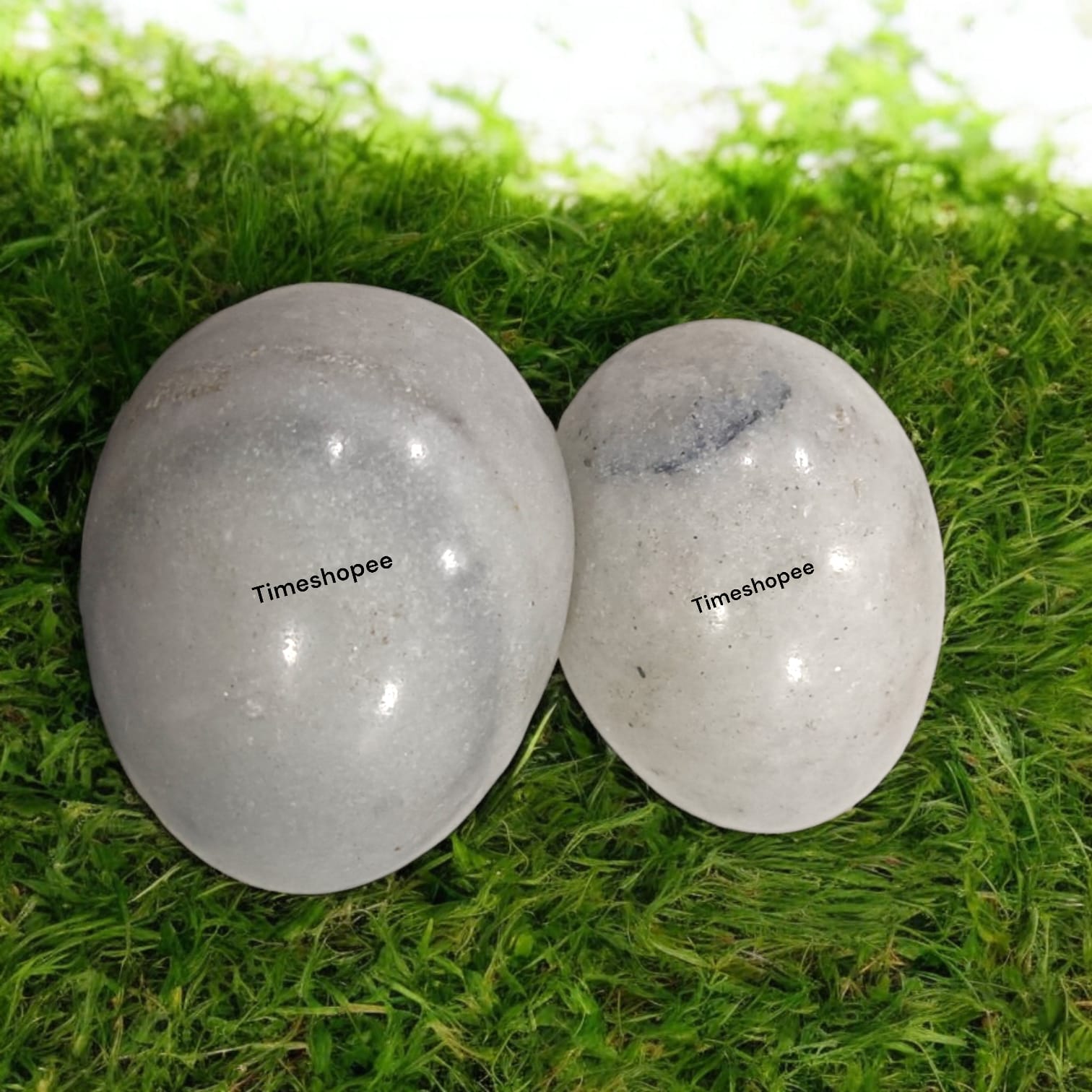 White and Black Shivling Stone for Tulsi and temple worship, representing Lord Shiva with an elegant dual-tone marble design.