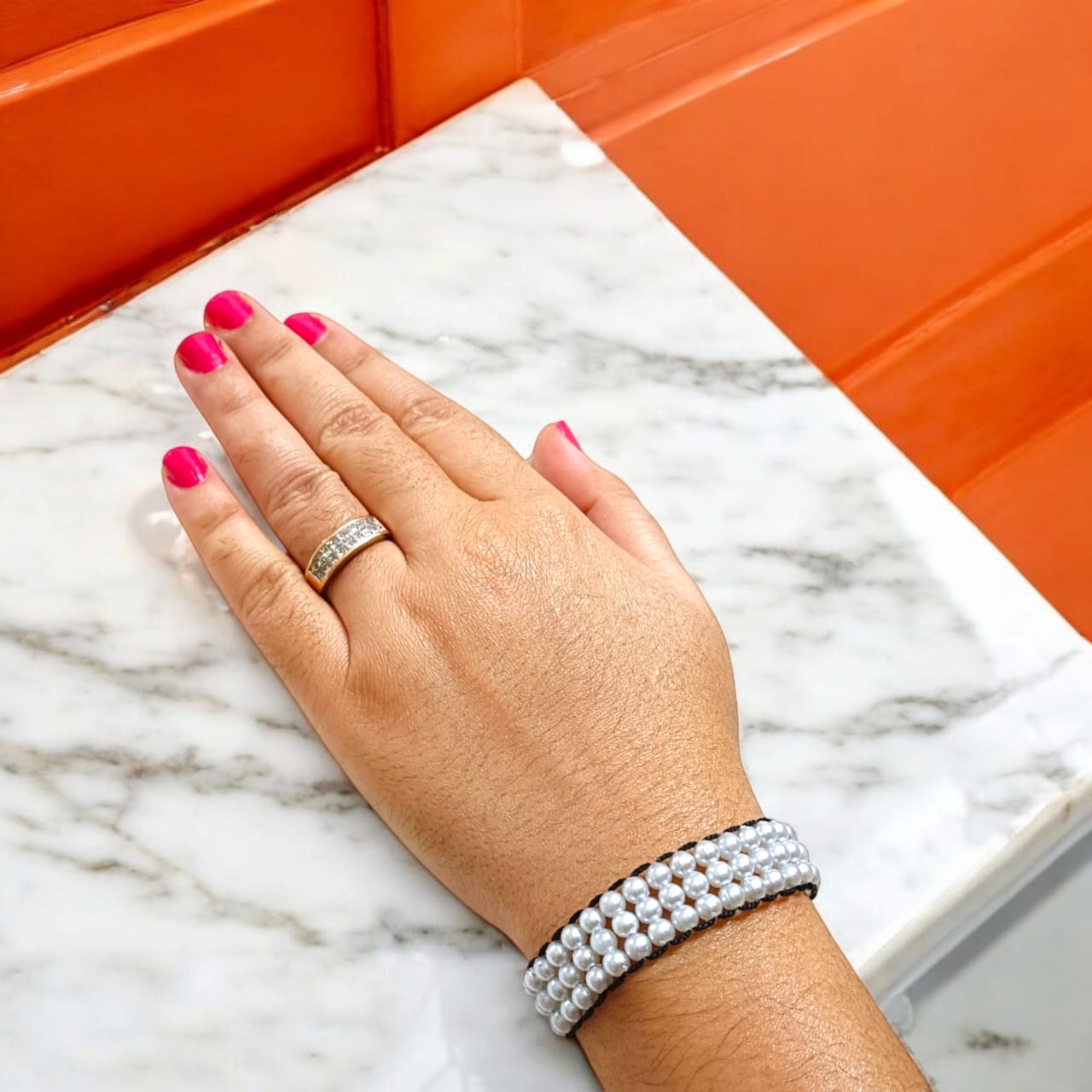 White pearl bracelet with adjustable sliding knot clasp, designed for girls and women, perfect for adding elegance to any outfit.