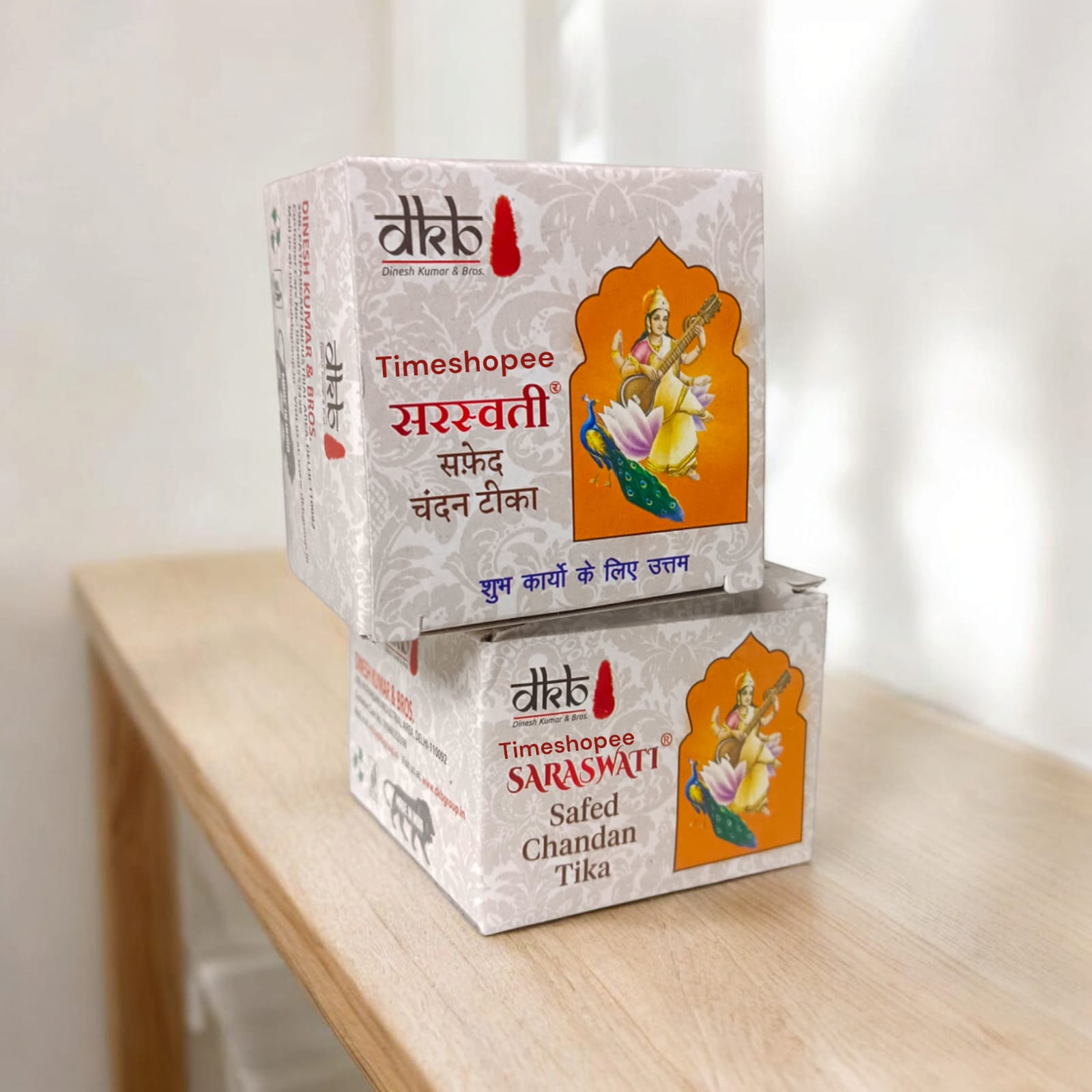 White sandalwood paste in a container, used for tilak, puja, and daily religious rituals, with a long-lasting fragrance.