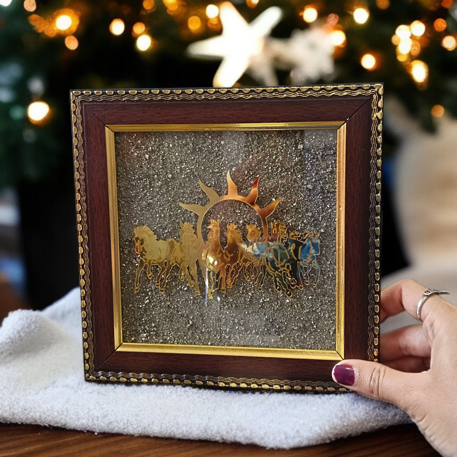 Wooden 7x7 inch Vastu frame featuring seven golden horses with rising sun background and embedded Pyrite stone, ideal for wealth and energy correction