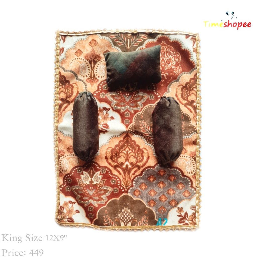 A luxurious 12X12 inch premium velvet bedsheet set with a pillow and blanket for Laddu Gopal, available in six stylish designs, ensuring comfort and elegance in your pooja area.