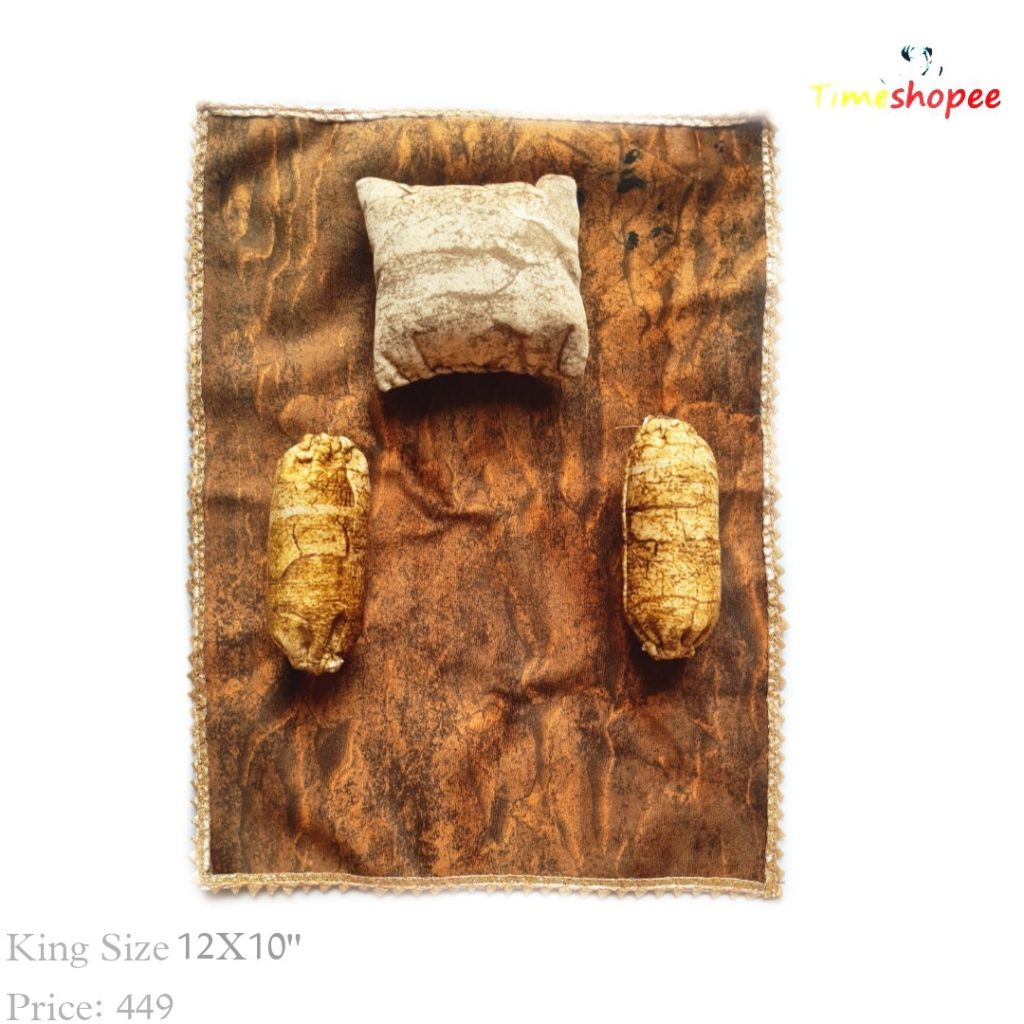 A luxurious 12X12 inch premium velvet bedsheet set with a pillow and blanket for Laddu Gopal, available in six stylish designs, ensuring comfort and elegance in your pooja area.