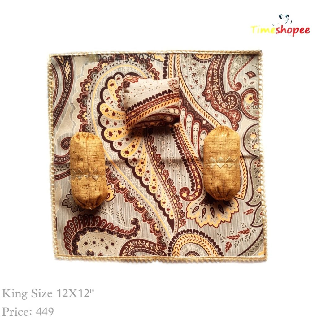 A luxurious 12X12 inch premium velvet bedsheet set with a pillow and blanket for Laddu Gopal, available in six stylish designs, ensuring comfort and elegance in your pooja area.