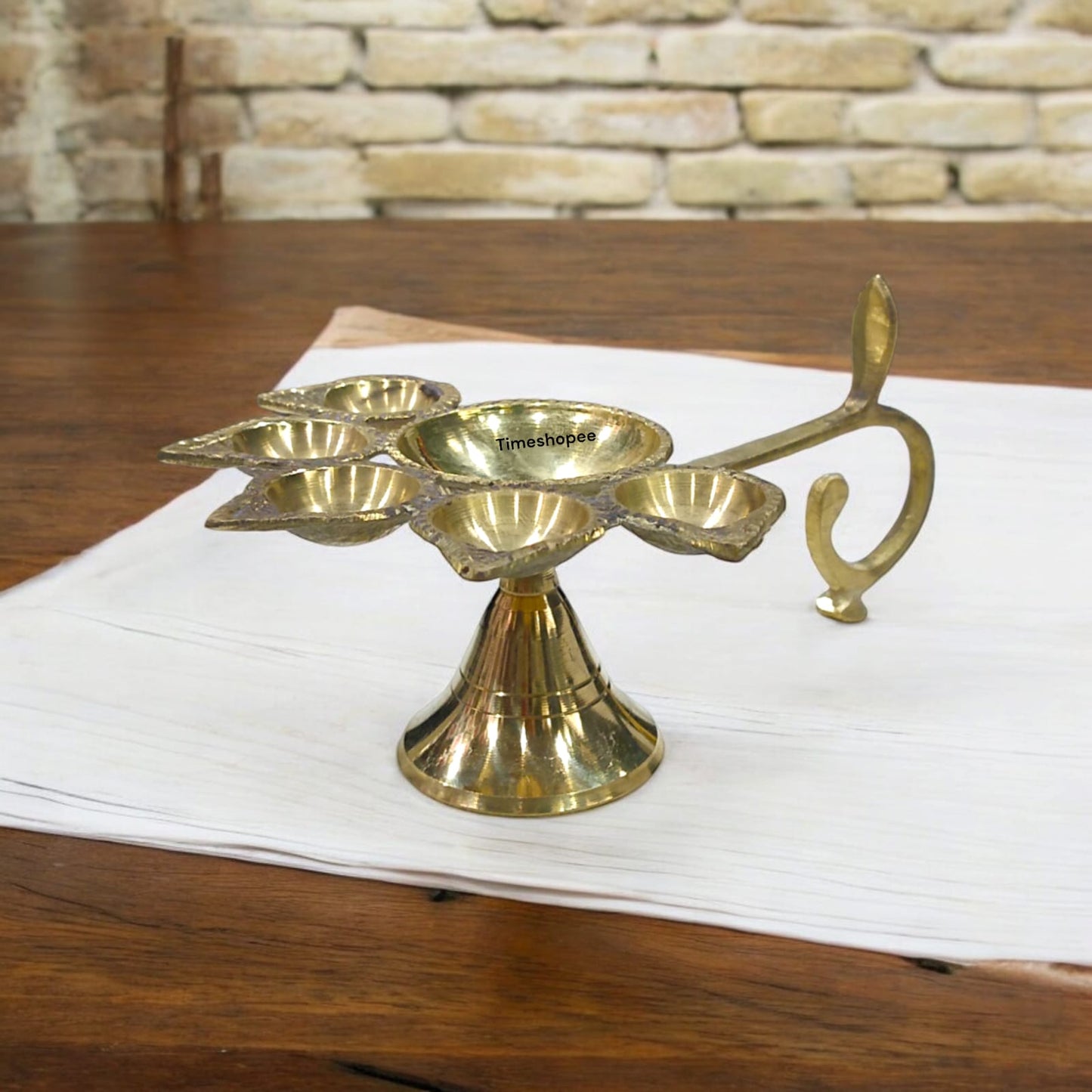 5-face brass Panch Mukhi Jyot for Aarti with elegant finish, available at Timeshopee.