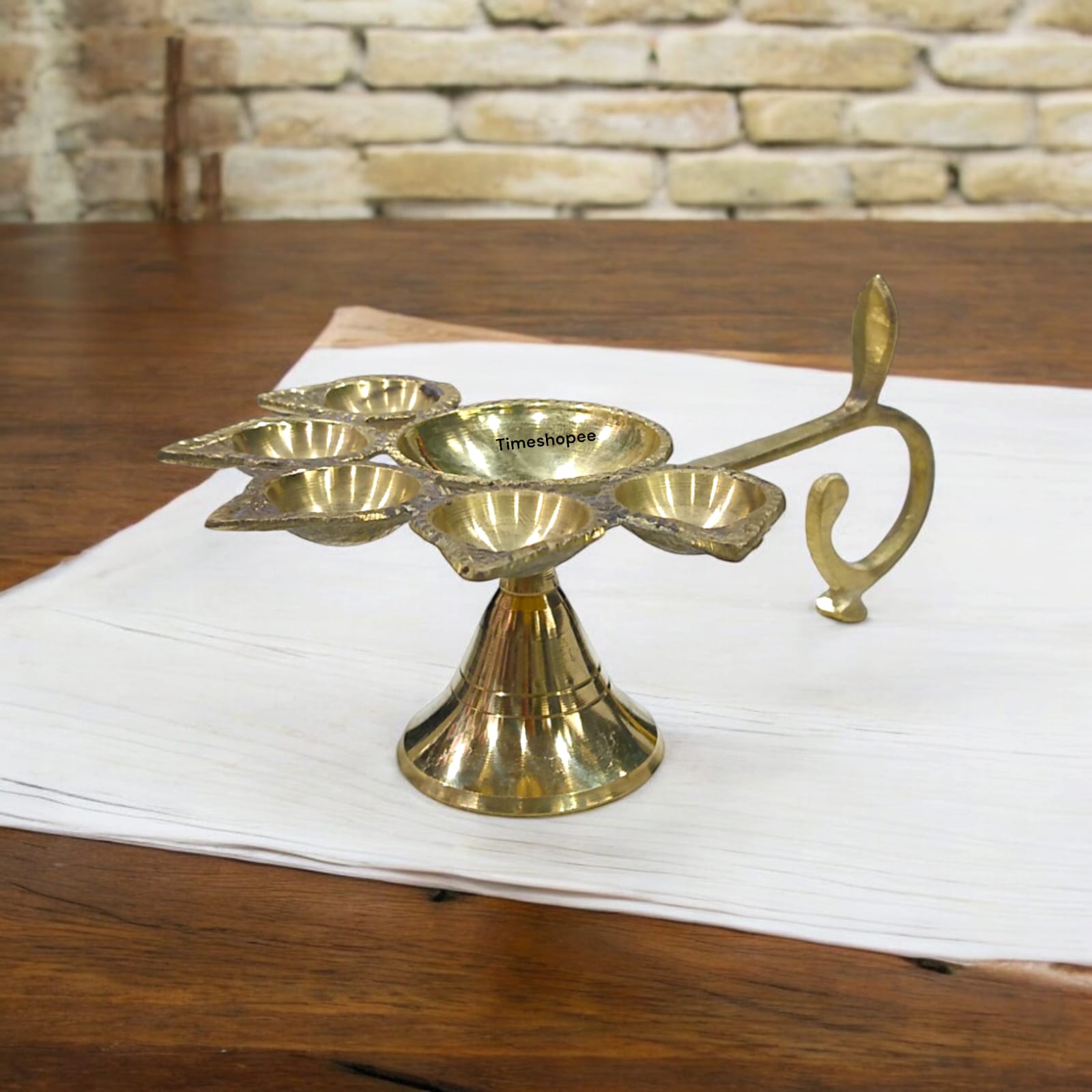5-face brass Panch Mukhi Jyot for Aarti with elegant finish, available at Timeshopee.