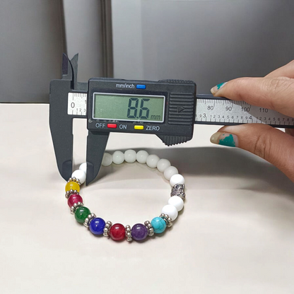 7 Chakra with Howlite Bracelet featuring colorful chakra stones and white howlite beads on an elastic thread, spiritual jewelry for men and women