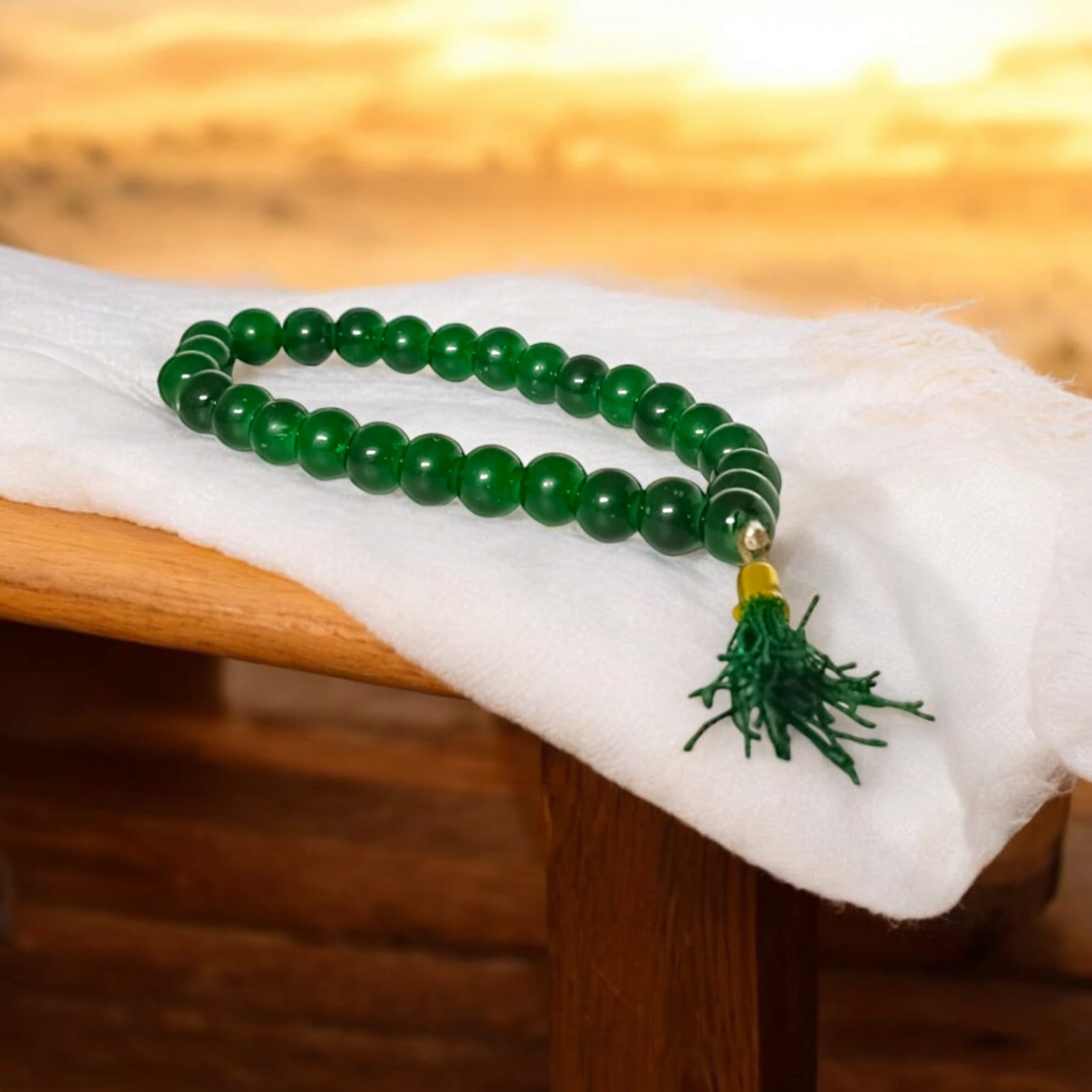 A 27+1 bead green agate mala, each bead measuring 8mm, shown with its lab certification. Ideal for meditation, wearing, or placement in car and office.