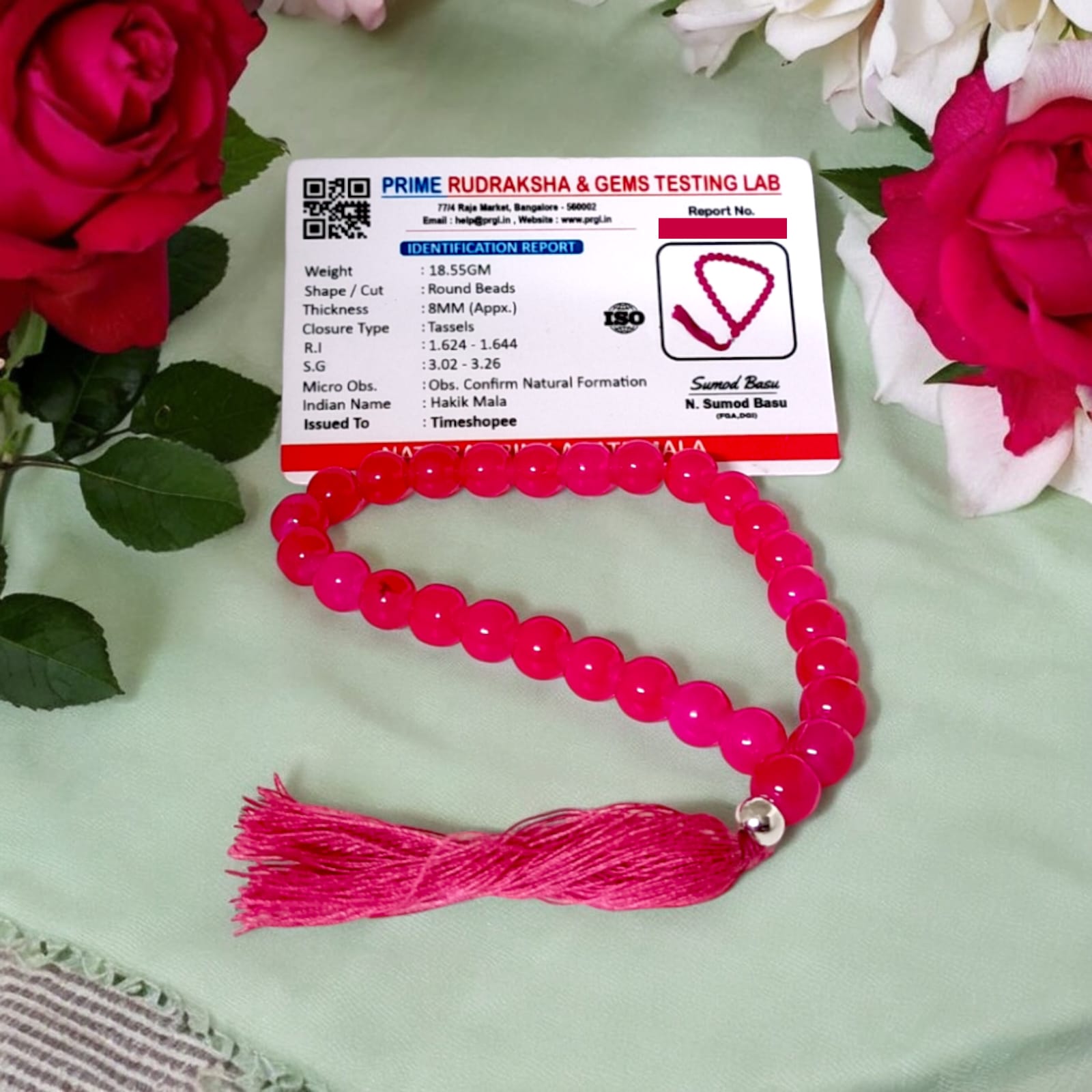 A 27+1 bead pink agate mala, each bead measuring 8mm, shown with its lab certification. Ideal for meditation, wearing, or enhancing positive energy in car and office.