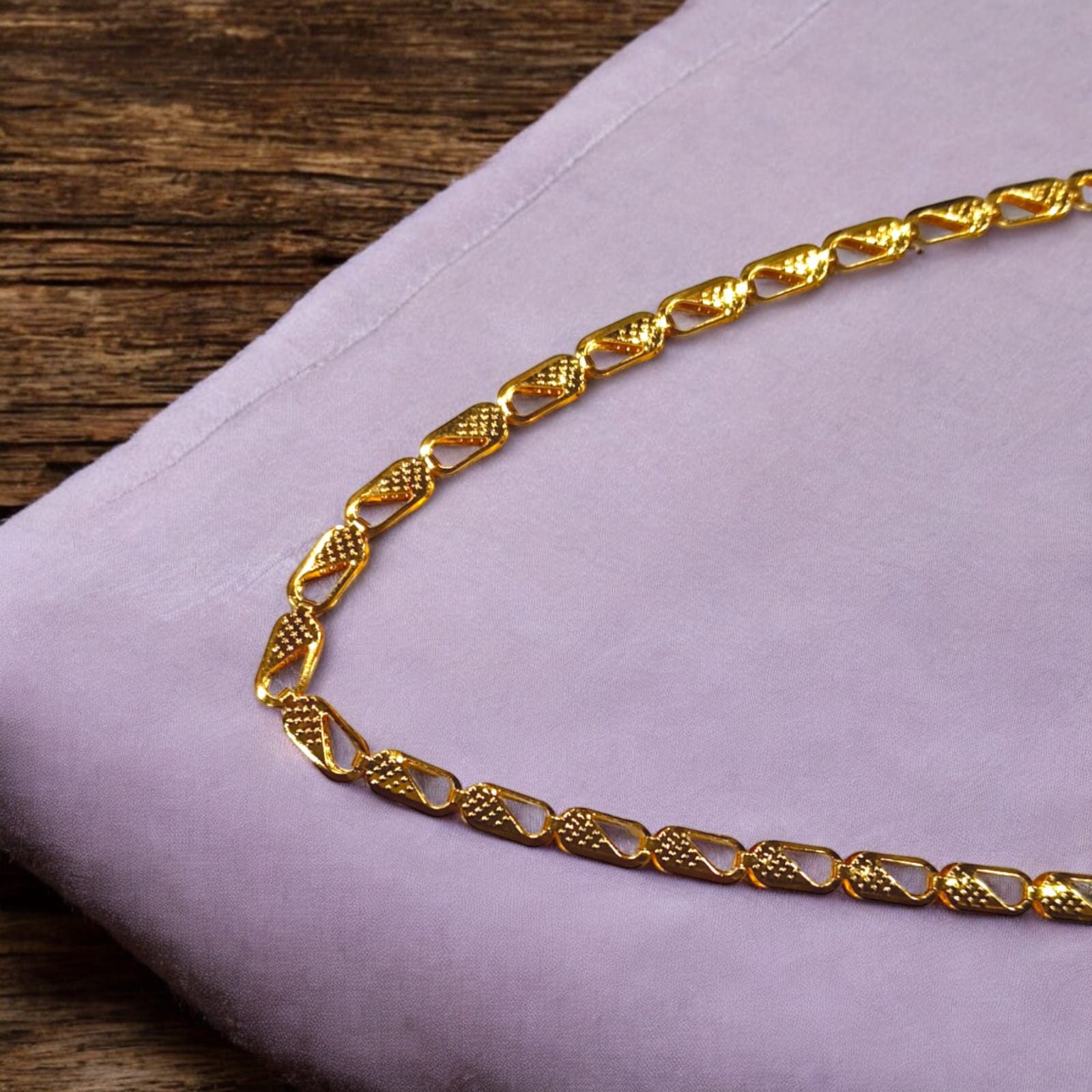 A 21-inch 1-gram gold plated chain featuring a vintage Nawabi design, suitable for both boys and girls.