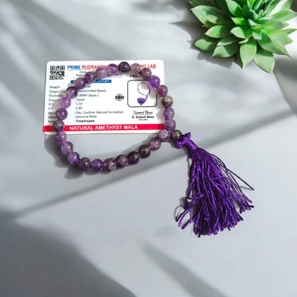 A 27+1 bead Amethyst mala with 8MM lab-certified beads, designed for meditation and jaap, perfect for use in travel, car, or office.