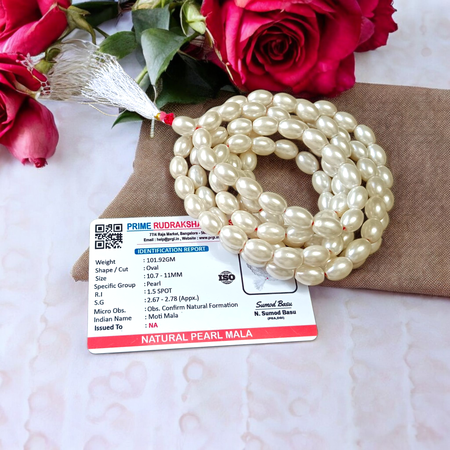 A beautiful Natural Pearl Mala with 108+1 white round beads (10-11mm), handcrafted and lab-certified, ideal for meditation and Japa rituals