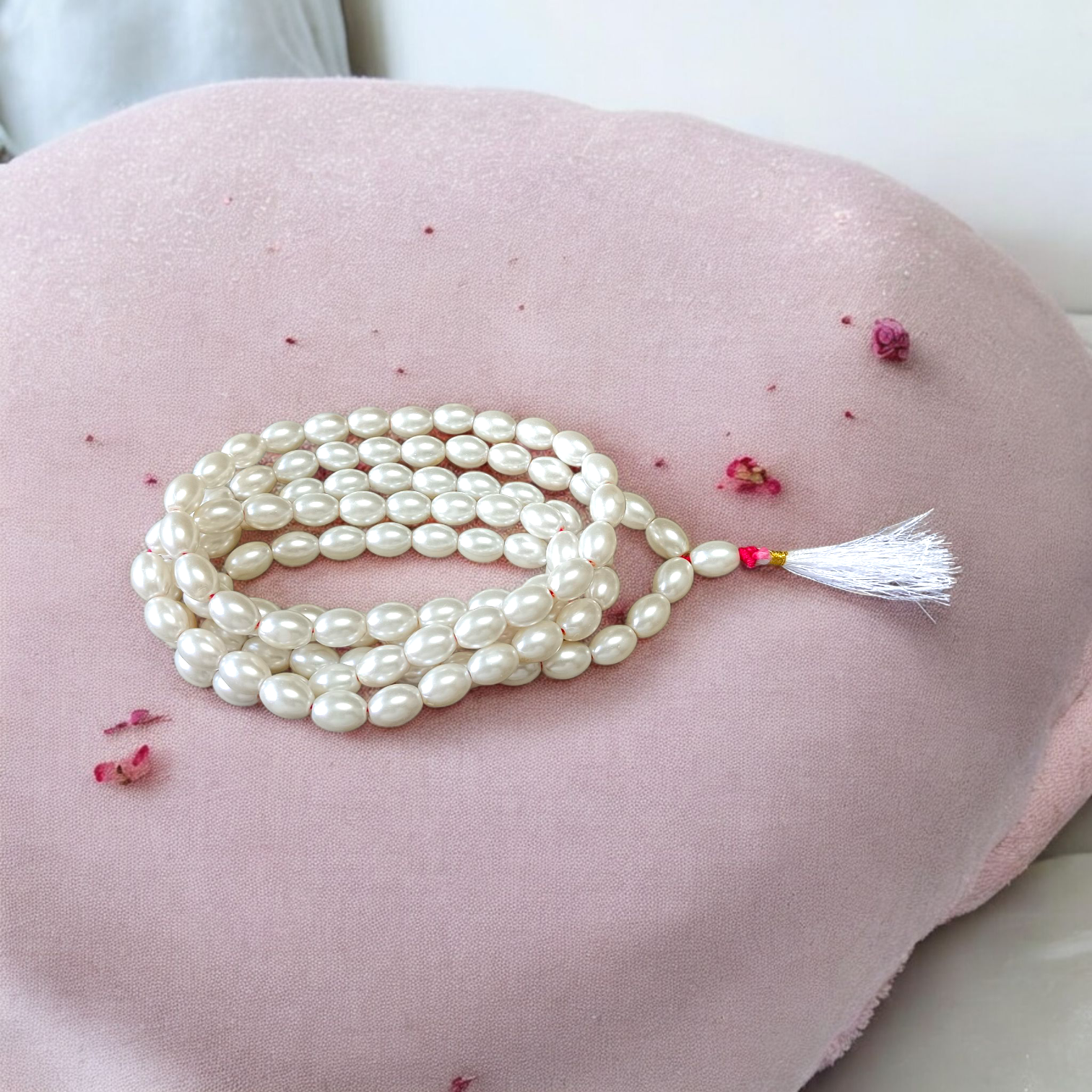 A beautiful Natural Pearl Mala with 108+1 white round beads (10-11mm), handcrafted and lab-certified, ideal for meditation and Japa rituals