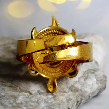 A close-up of the Kachua Pukhraj Ring, featuring a bright yellow Pukhraj (Yellow Sapphire) gemstone set in a tortoise-shaped design made from Ashtdhatu. The ring is adjustable and suitable for both men and women.