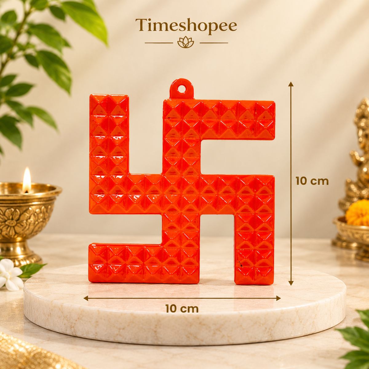 A decorative metal wall hanging featuring a Swastik and 68 Vaastu Pyramid, measuring 10X10 CM, suitable for hanging in temples, offices, and homes to promote positive energy.