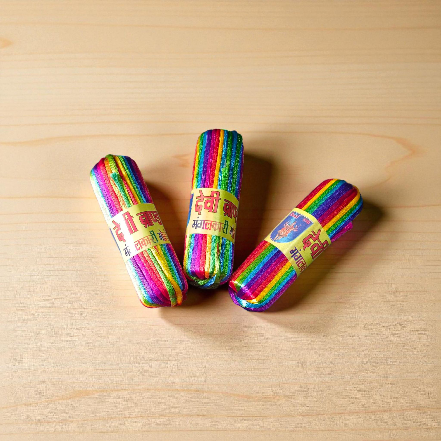 A pack of 5 colorful silk moli threads, each 11 feet long, traditionally used in Hindu pooja rituals for protection, blessings, and mannat dhaga ceremonies