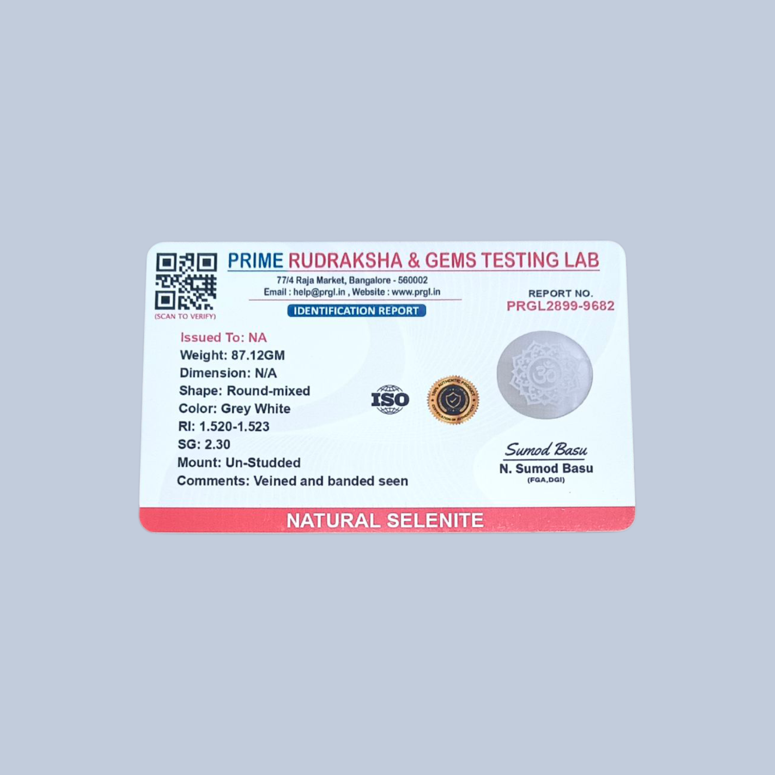 A polished round Selenite charging plate featuring a carved Om symbol, used for pooja, décor, and energy cleansing