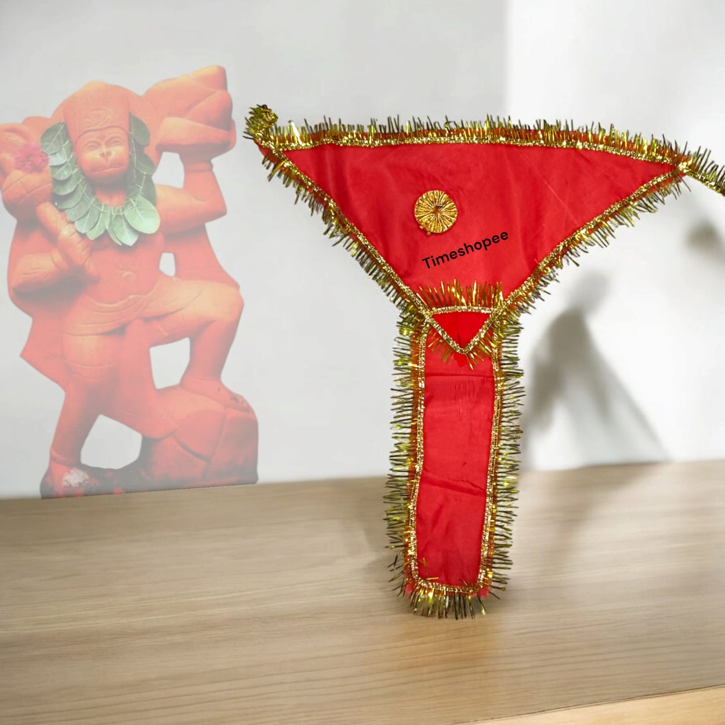 A red 18X18-inch traditional langot for Lord Hanuman, symbolizing strength and devotion, ideal for religious use in temples and home shrines.