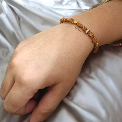 A stretchable 2 Mukhi Rudraksha bracelet featuring 8MM lab-certified beads designed to improve communication skills and promote clarity of thought.