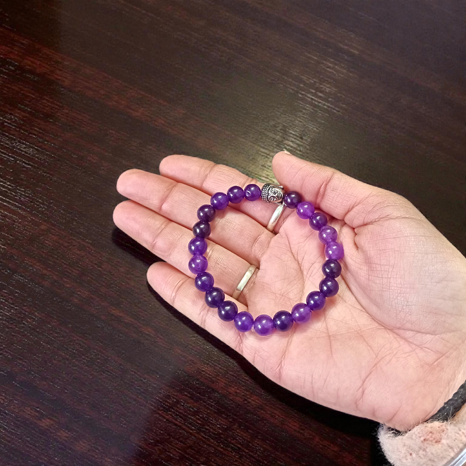 Amethyst bracelet with 8MM beads, showcasing its elegant design and lab certification