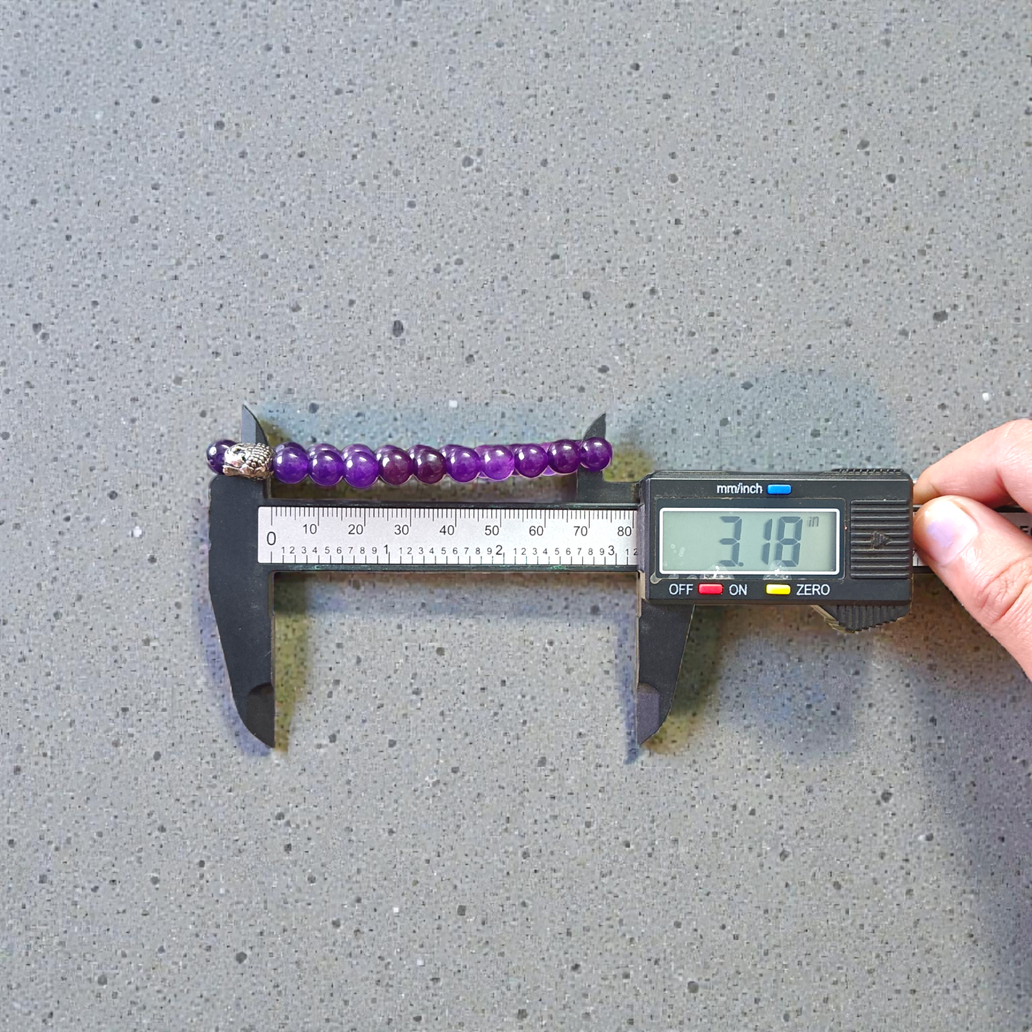 Amethyst bracelet with 8MM beads, showcasing its elegant design and lab certification
