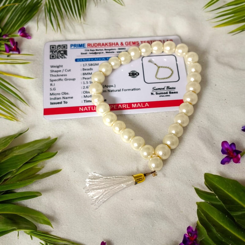 An elegant Pearl Mala featuring 27+1 original 8MM lab-certified pearls, arranged neatly for display.