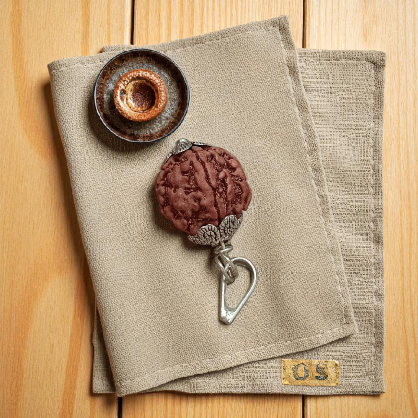 Authentic 5 Mukhi Rudraksha Mala and Pendant Combo placed on a white background with sacred thread and spiritual packaging