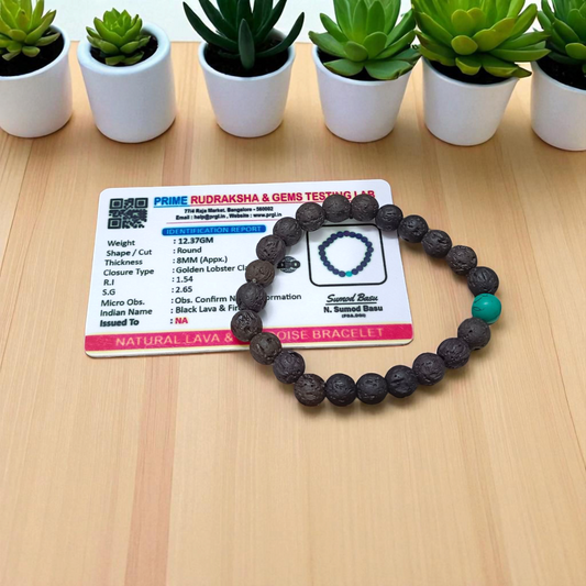 Bracelet made with 8mm black lava stones and turquoise (Firoza) beads, arranged on stretchable thread and placed on a soft neutral background