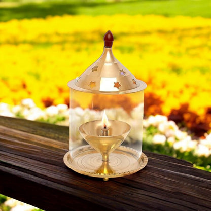 Brass Akhand Jyot with borosilicate glass, available in two sizes, designed for burning desi ghee, with a protective glass cover for steady flame.